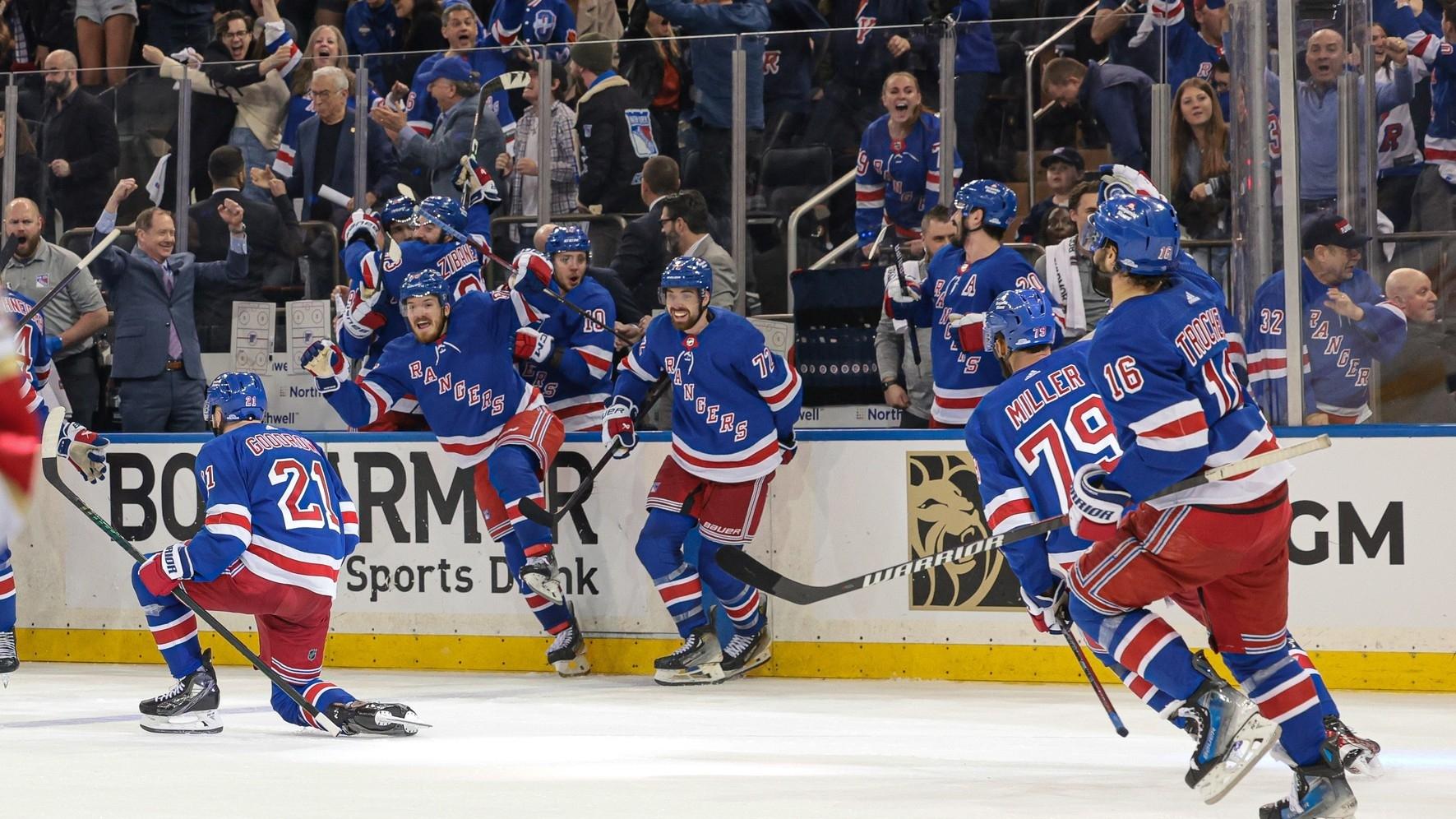 New York Rangers center Barclay Goodrow (21) celebrates his game-winning overtime goal with teammates in game two of the Eastern Conference Final of the 2024 Stanley Cup Playoffs against the Florida Panthers at Madison Square Garden. / Vincent Carchietta-USA TODAY Sports