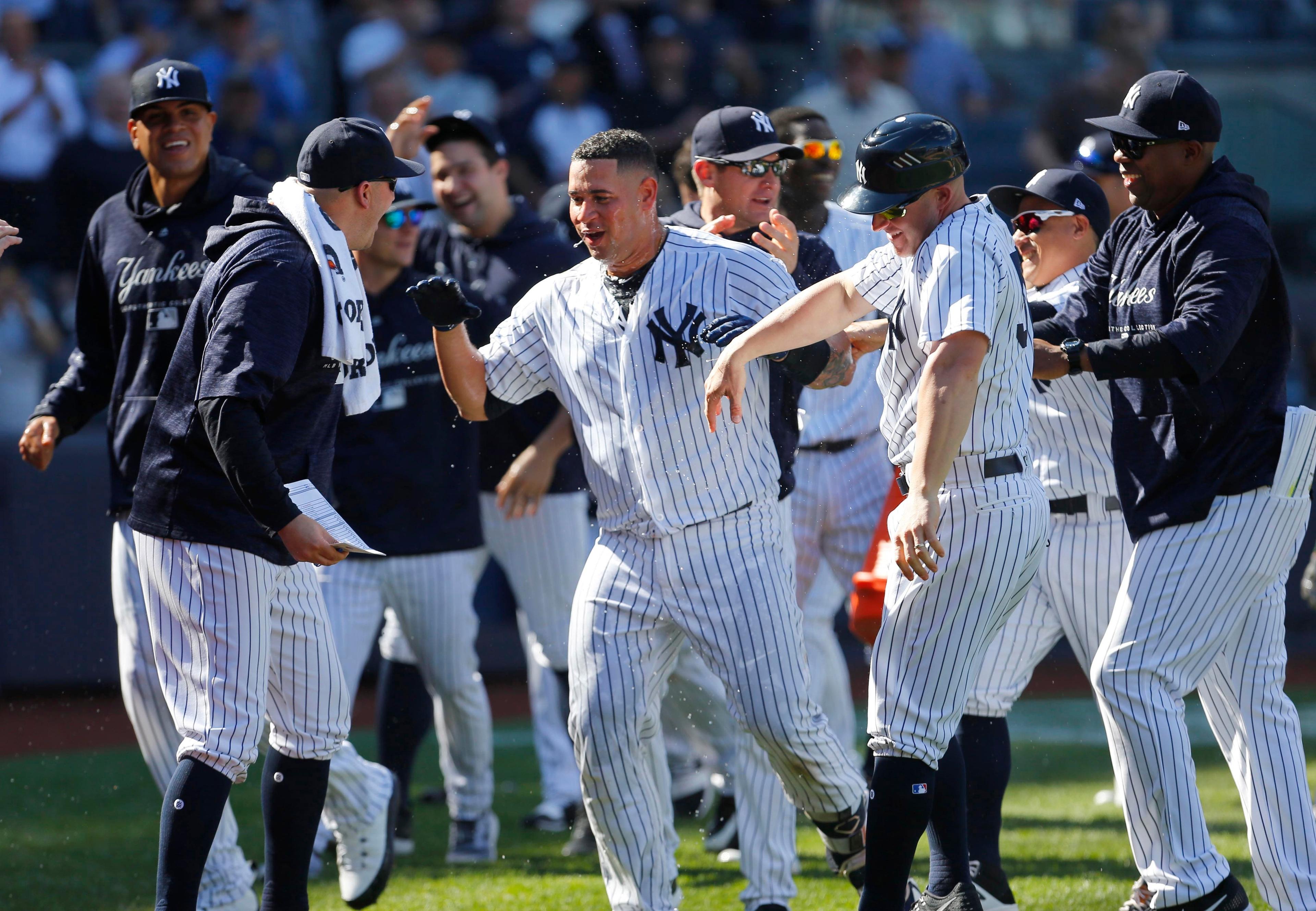 Apr 26, 2018; Bronx, NY, USA; New York Yankees catcher Gary Sanchez (24) celebrates after hitting a three run home run in the ninth inning against the Minnesota Twins to win the game at Yankee Stadium. Mandatory Credit: Noah K. Murray-USA TODAY Sports / Noah K. Murray