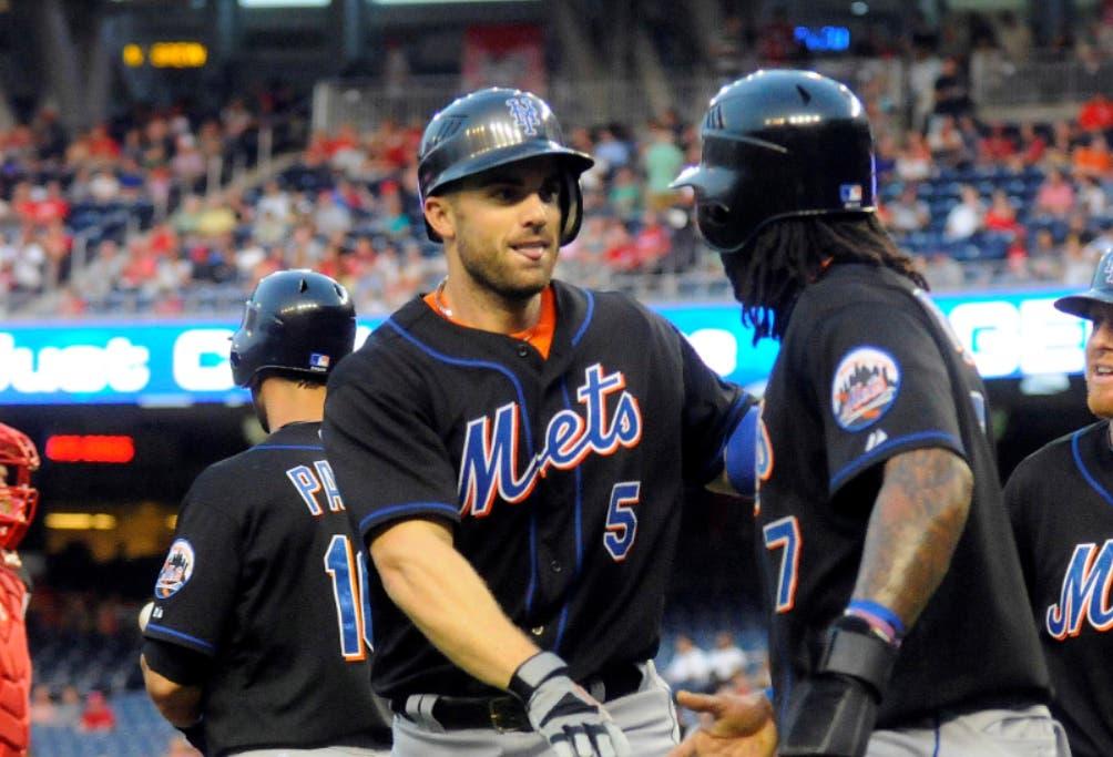 Sep 2, 2011; Washington, DC, USA; New York Mets third baseman David Wright (5) is congratulated by shortstop Jose Reyes (7) after hitting a home run during the first inning against the Washington Nationals at Nationals Park. Mandatory Credit: Brad Mills-USA TODAY Sports / Brad Mills-USA TODAY Sports