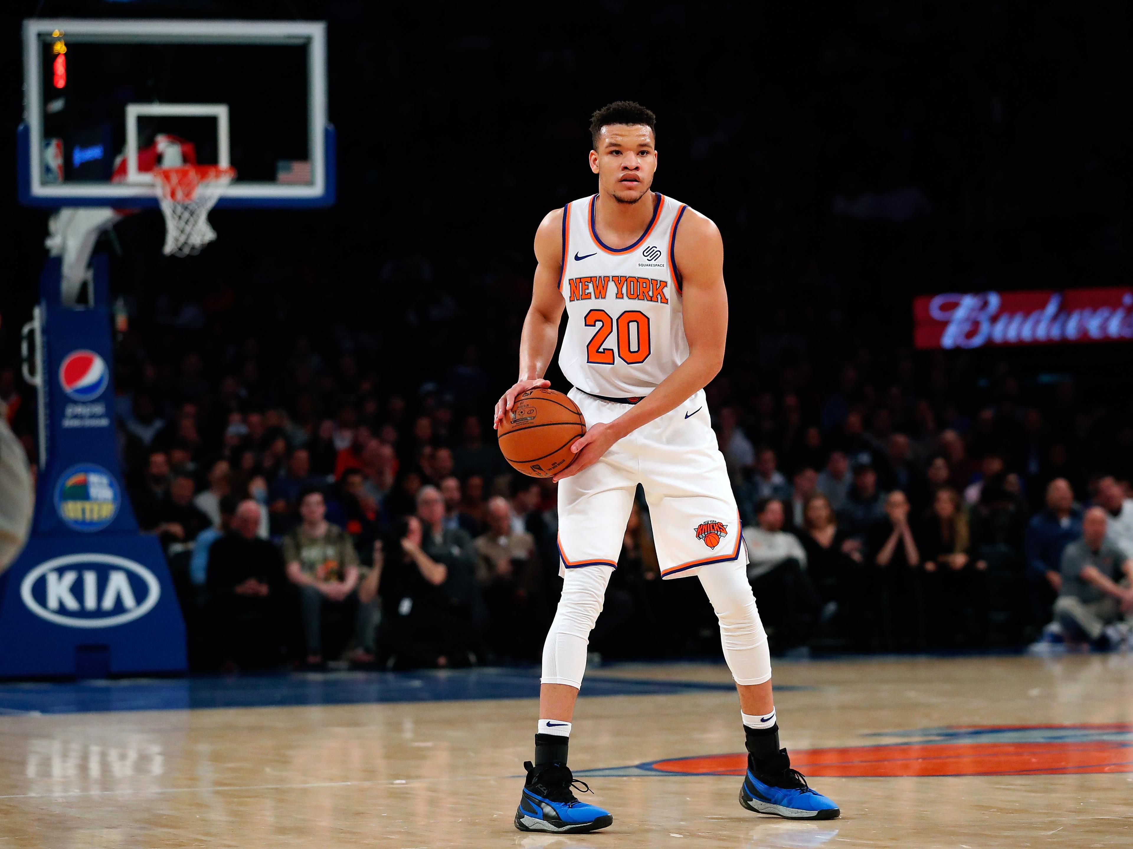 Nov 24, 2019; New York, NY, USA; New York Knicks forward Kevin Knox II (20) handles the ball against the Brooklyn Nets during the first half at Madison Square Garden. Mandatory Credit: Noah K. Murray-USA TODAY Sports / Noah K. Murray