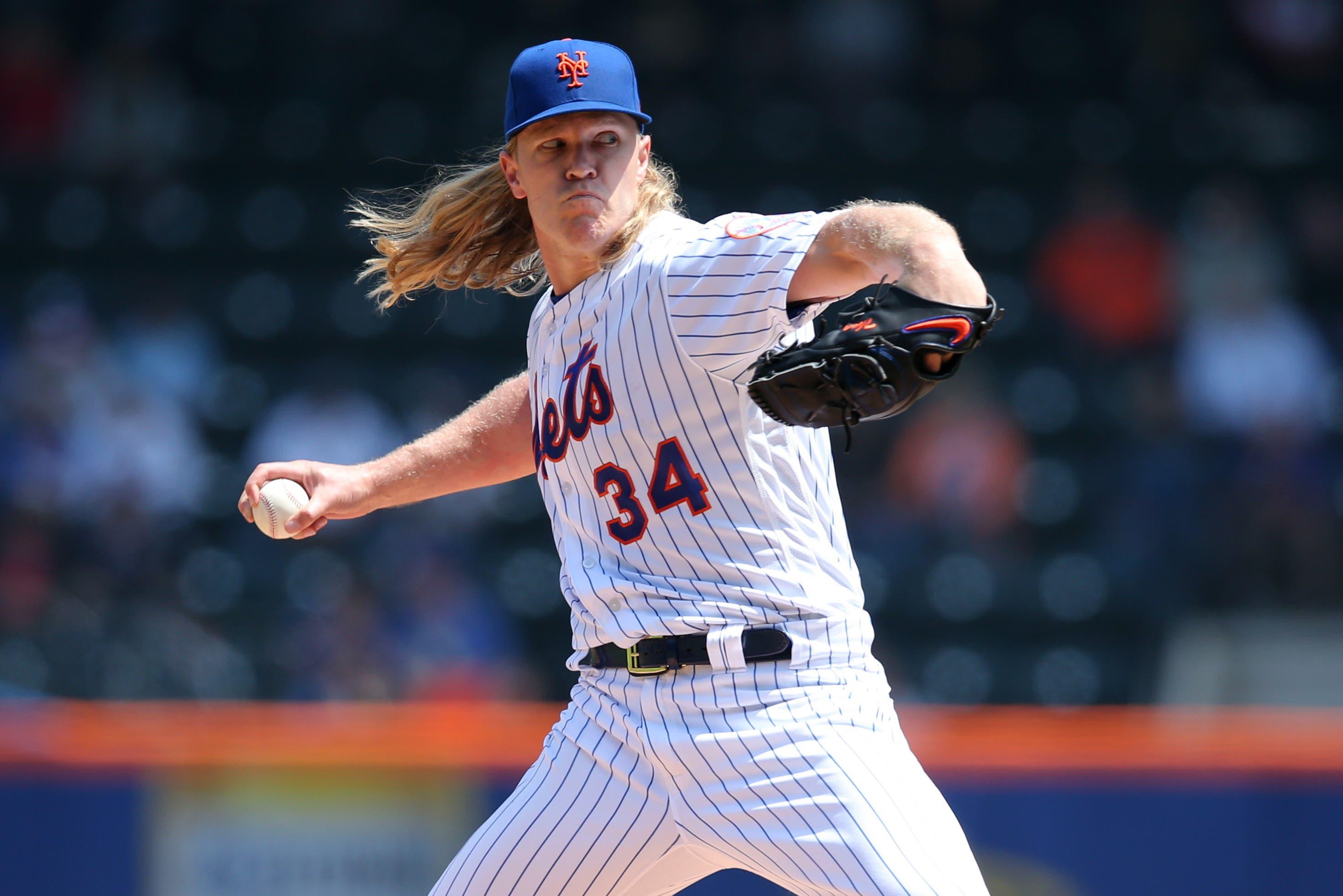 May 2, 2019; New York City, NY, USA; New York Mets starting pitcher Noah Syndergaard (34) pitches against the Cincinnati Reds during the first inning at Citi Field. Mandatory Credit: Brad Penner-USA TODAY Sports / Brad Penner