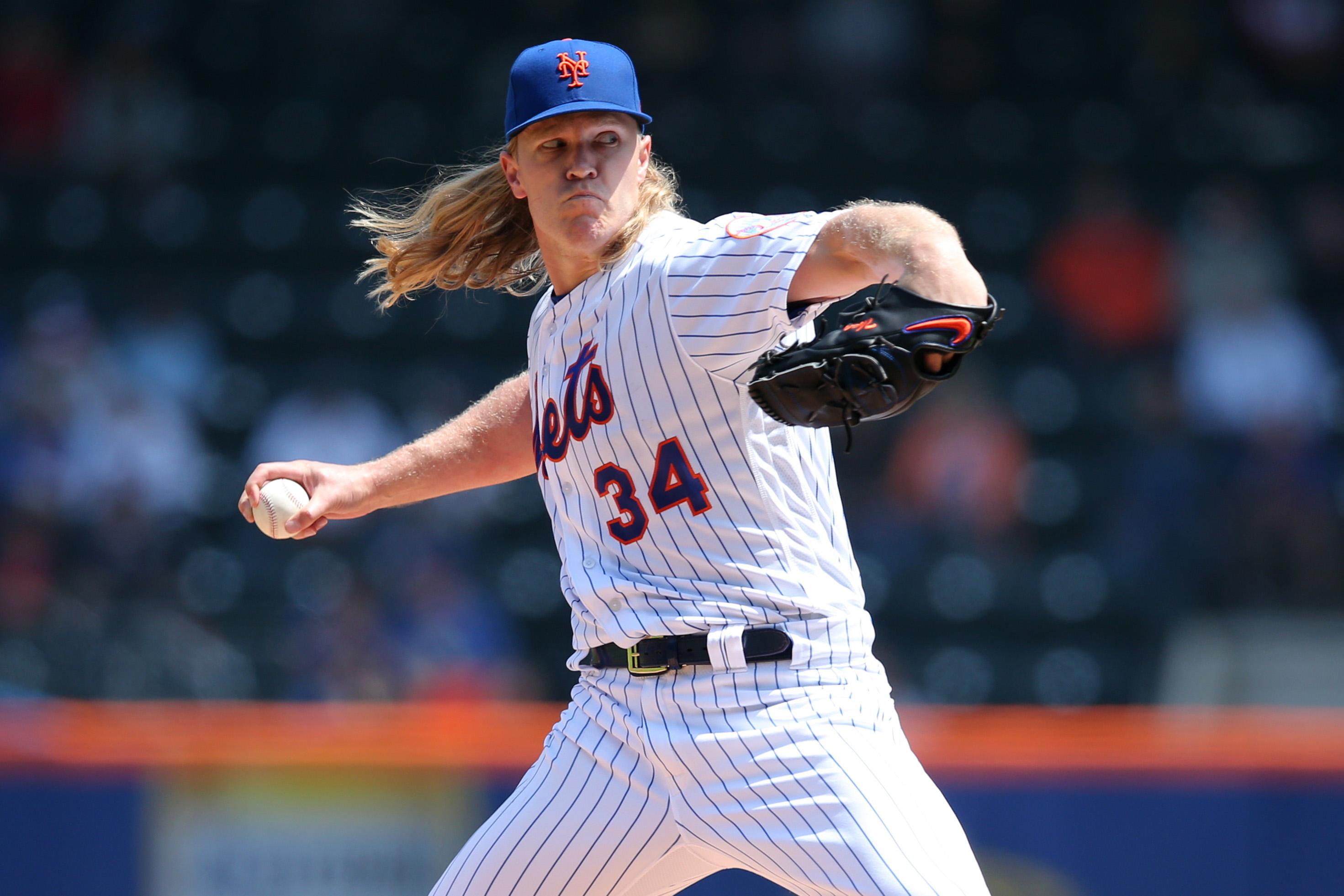 May 2, 2019; New York City, NY, USA; New York Mets starting pitcher Noah Syndergaard (34) pitches against the Cincinnati Reds during the first inning at Citi Field. Mandatory Credit: Brad Penner-USA TODAY Sports