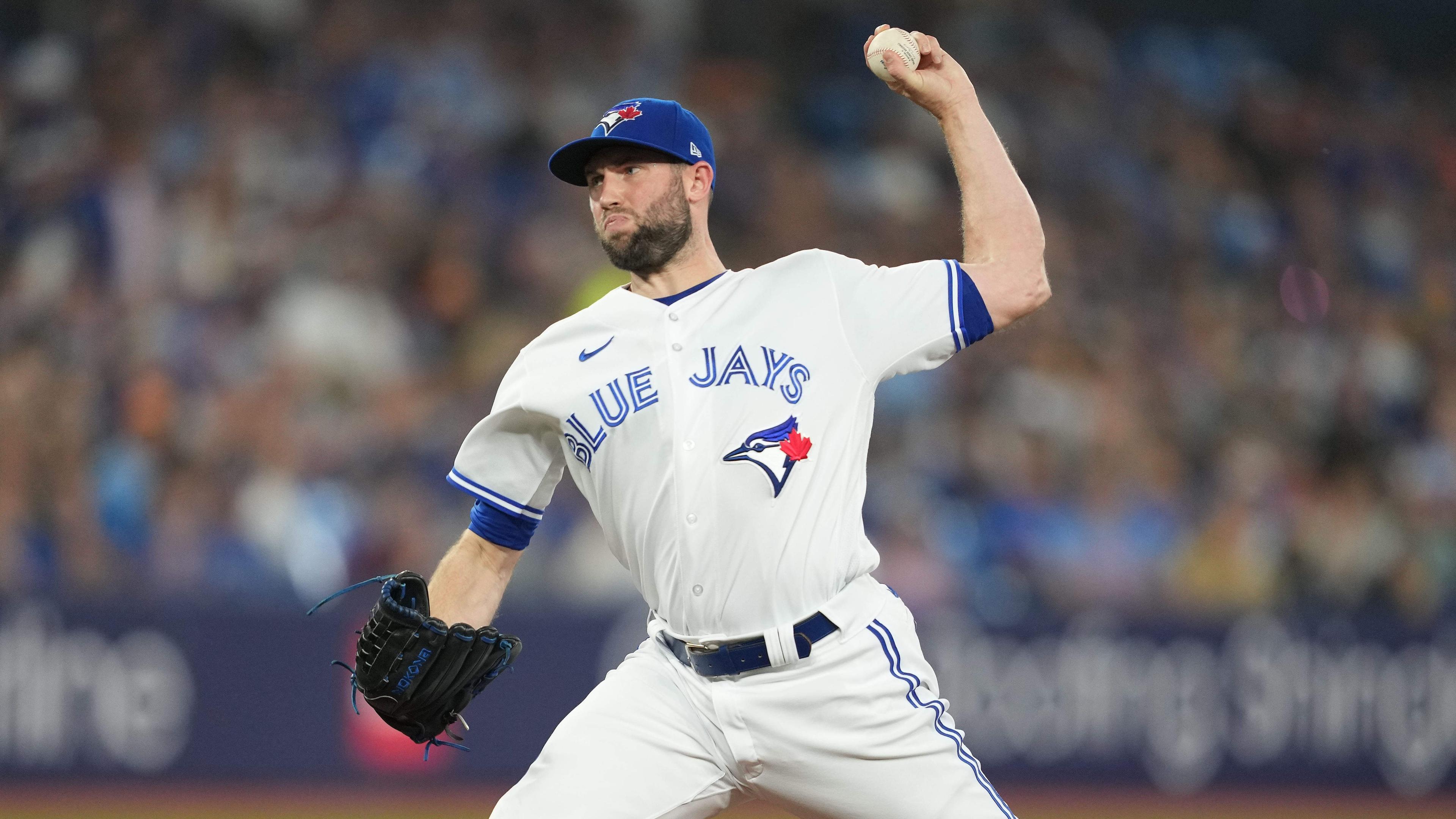 Toronto Blue Jays relief pitcher Tim Mayza (58) throws a pitch against the Los Angeles Angels during the eighth inning at Rogers Centre / Nick Turchiaro - USA TODAY Sports