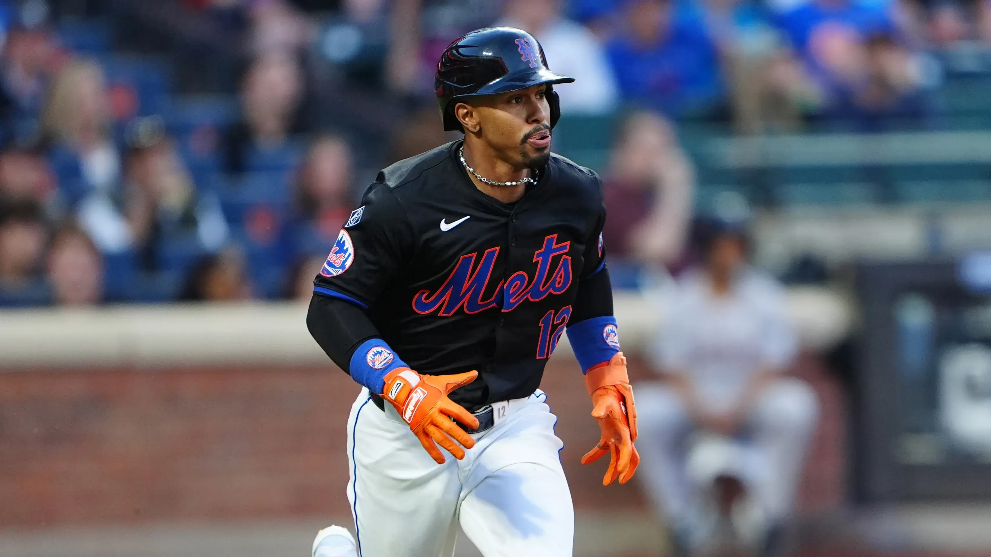 New York Mets shortstop Francisco Lindor (12) runs out an RBI double against the Arizona Diamondbacks during the second inning at Citi Field. / Gregory Fisher - USA TODAY Sports