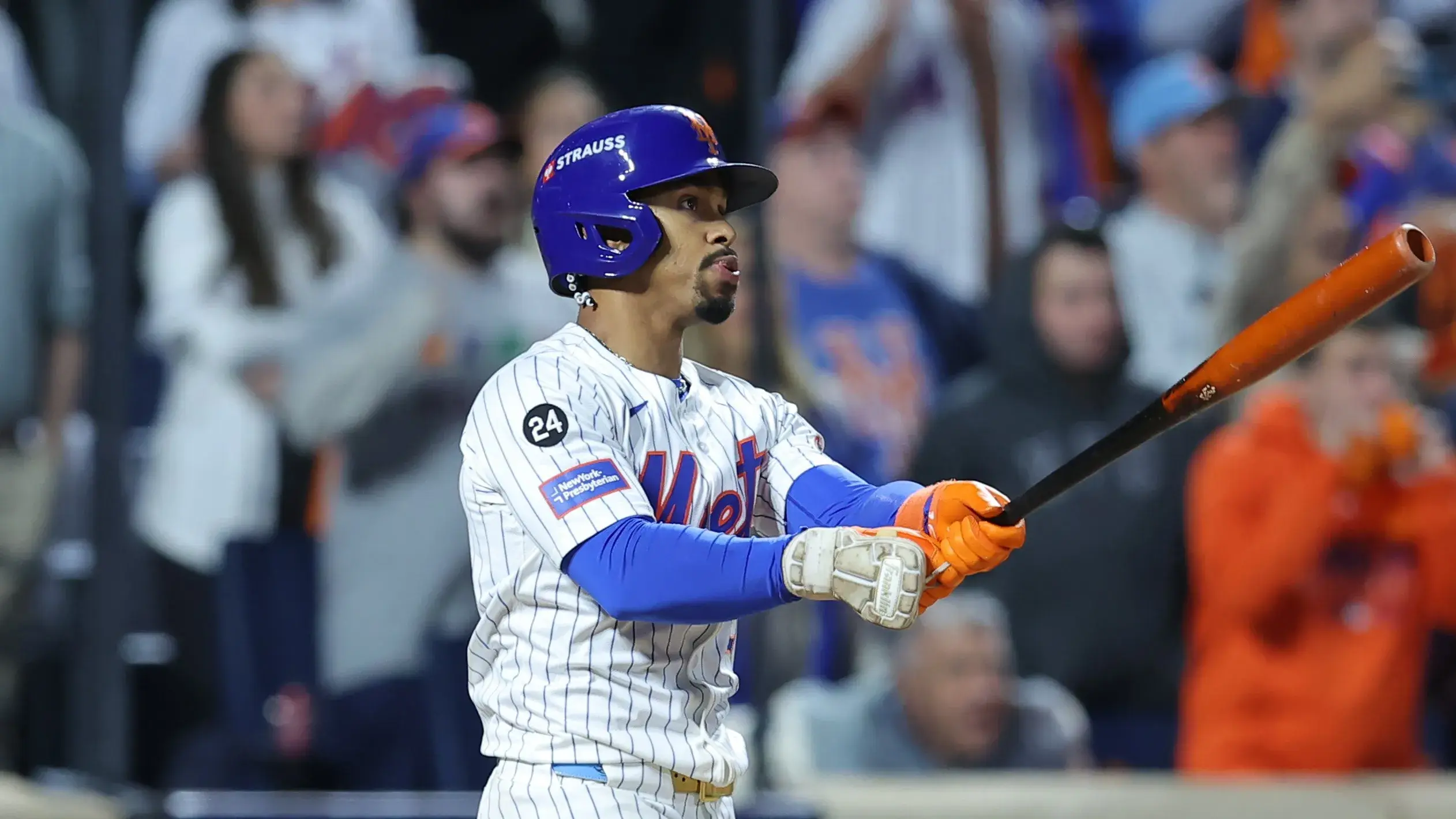 Oct 9, 2024; New York, New York, USA; New York Mets shortstop Francisco Lindor (12) hits a grand slam against the Philadelphia Phillies in the sixth inning in game four of the NLDS for the 2024 MLB Playoffs at Citi Field. / Brad Penner-Imagn Images