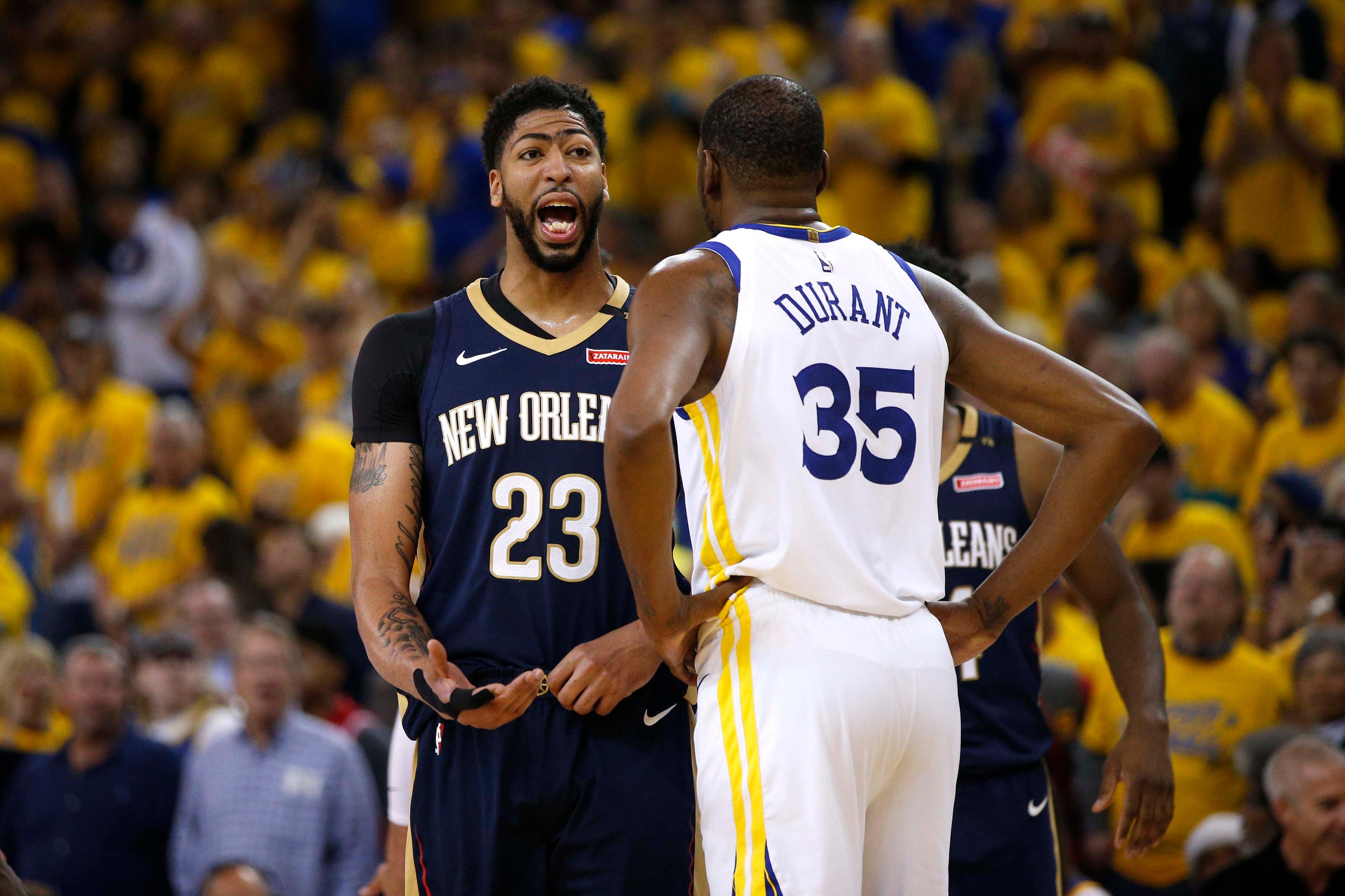 Apr 28, 2018; Oakland, CA, USA; New Orleans Pelicans forward Anthony Davis (23) talks with Golden State Warriors forward Kevin Durant (35) in the second quarter in game one of the second round of the 2018 NBA Playoffs at Oracle Arena. Mandatory Credit: Cary Edmondson-USA TODAY Sports