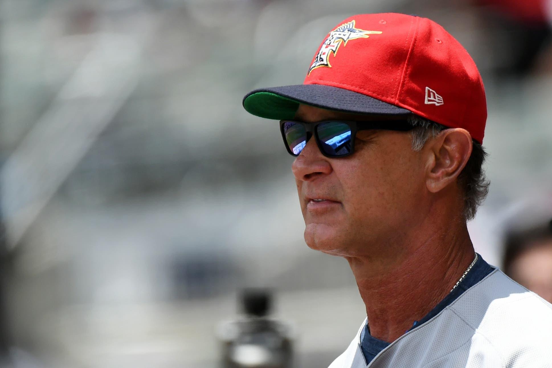 Jul 7, 2019; Cumberland, GA, USA; Miami Marlins manager Don Mattingly (8) in the dugout against the Atlanta Braves at SunTrust Park. Mandatory Credit: Adam Hagy-USA TODAY Sports / Adam Hagy