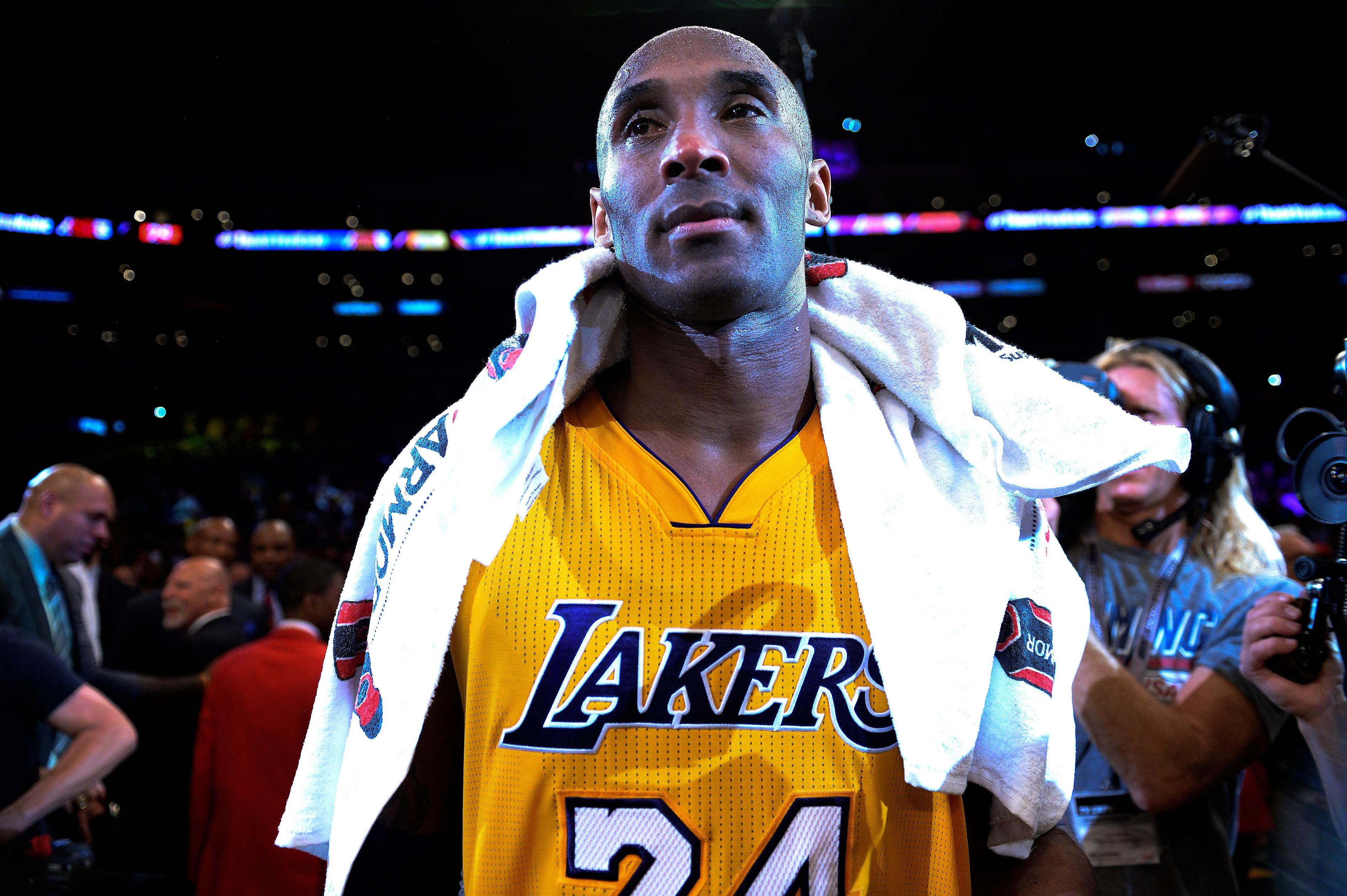 Apr 13, 2016; Los Angeles, CA, USA; Los Angeles Lakers forward Kobe Bryant (24) looks on after the Lakers defeat of the Utah Jazz 101-96 at Staples Center in Bryant's final game of his career. Bryant scored 60 points in the game. Mandatory Credit: Robert Hanashiro-USA TODAY Sports / Robert Hanashiro