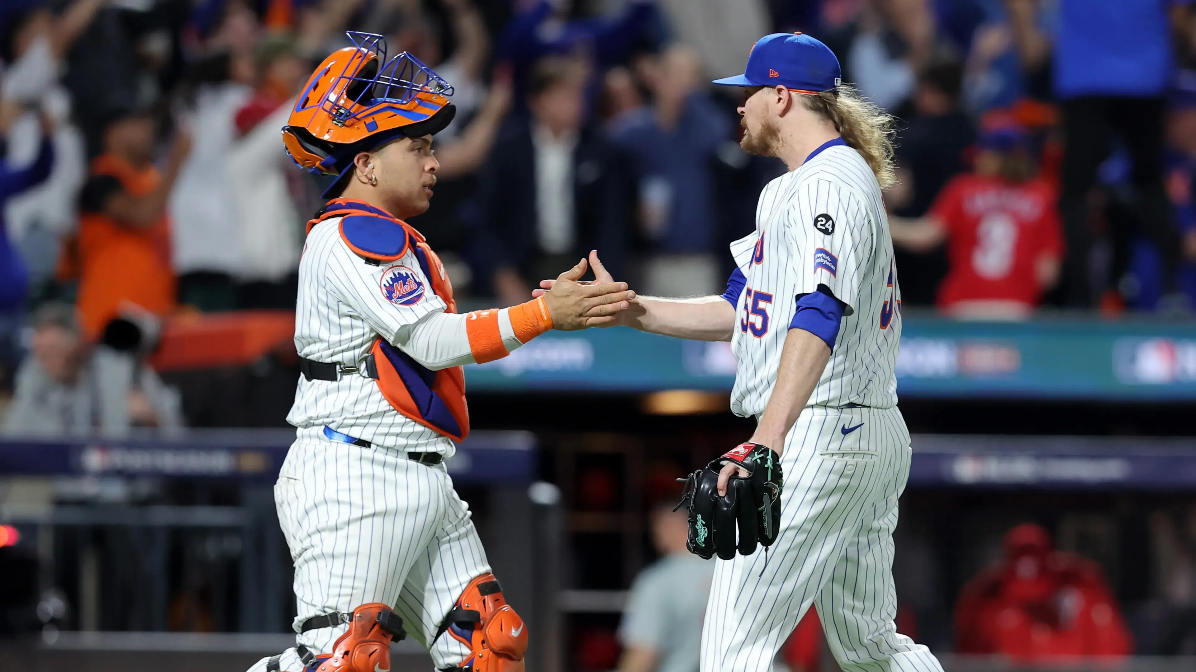 Oct 8, 2024; New York City, New York, USA; New York Mets pitcher Ryne Stanek (55) celebrates catcher Francisco Alvarez (4) after defeating the Philadelphia Phillies in game three of the NLDS for the 2024 MLB Playoffs at Citi Field. / Brad Penner - Imagn Images