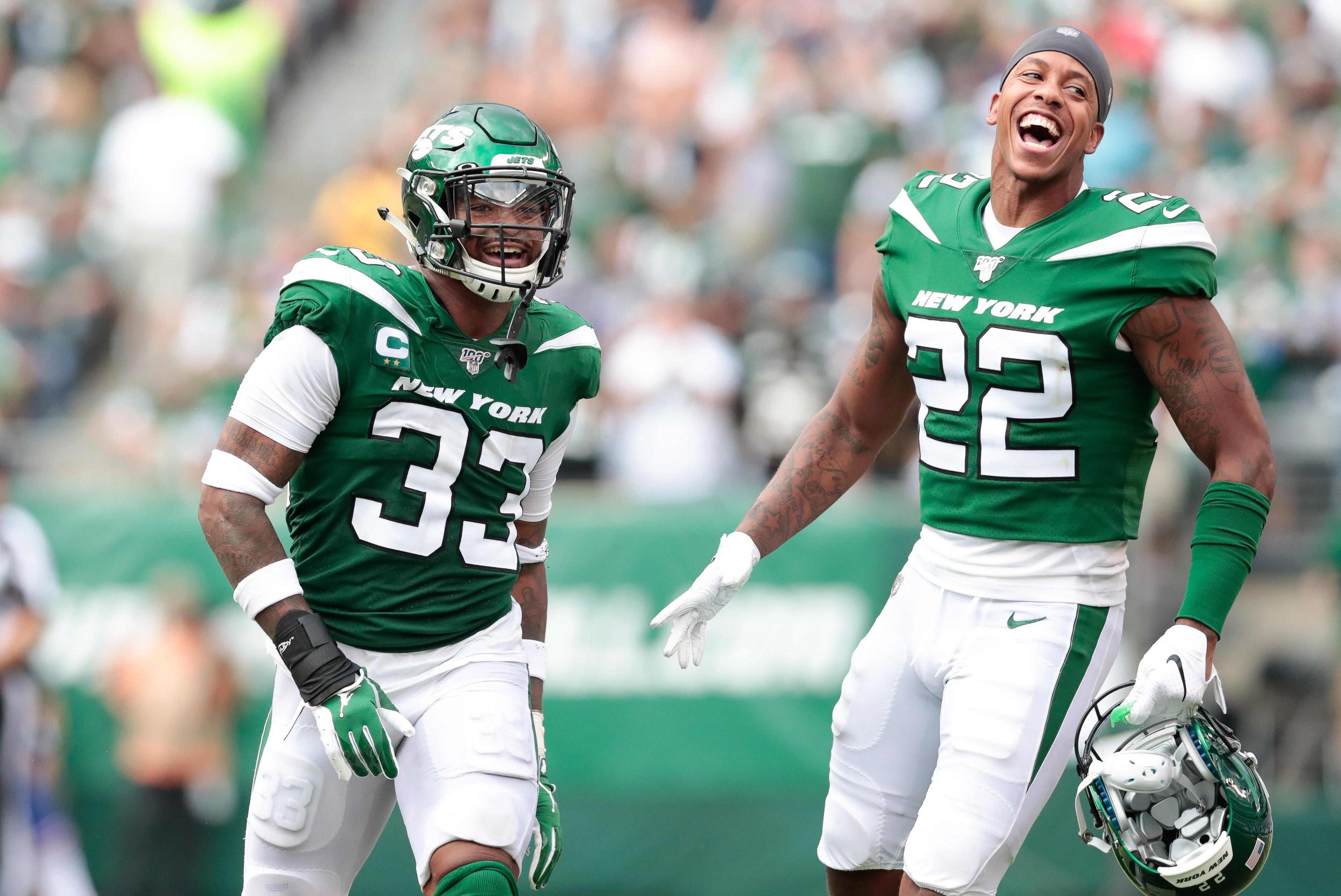 Sep 8, 2019; East Rutherford, NJ, USA; New York Jets strong safety Jamal Adams (33) and cornerback Trumaine Johnson (22) celebrate during the second half against the Buffalo Bills at MetLife Stadium. Mandatory Credit: Vincent Carchietta-USA TODAY Sports / Vincent Carchietta