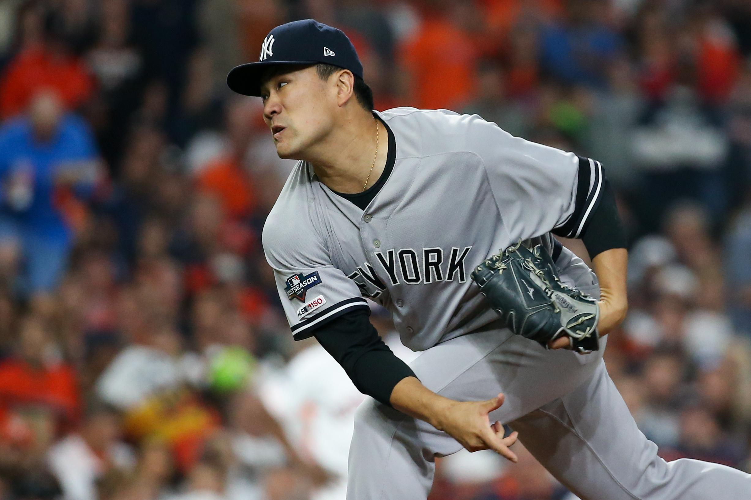 Oct 12, 2019; Houston, TX, USA; New York Yankees starting pitcher Masahiro Tanaka (19) throws against the Houston Astros in the first inning in game one of the 2019 ALCS playoff baseball series at Minute Maid Park. Mandatory Credit: Troy Taormina-USA TODAY Sports