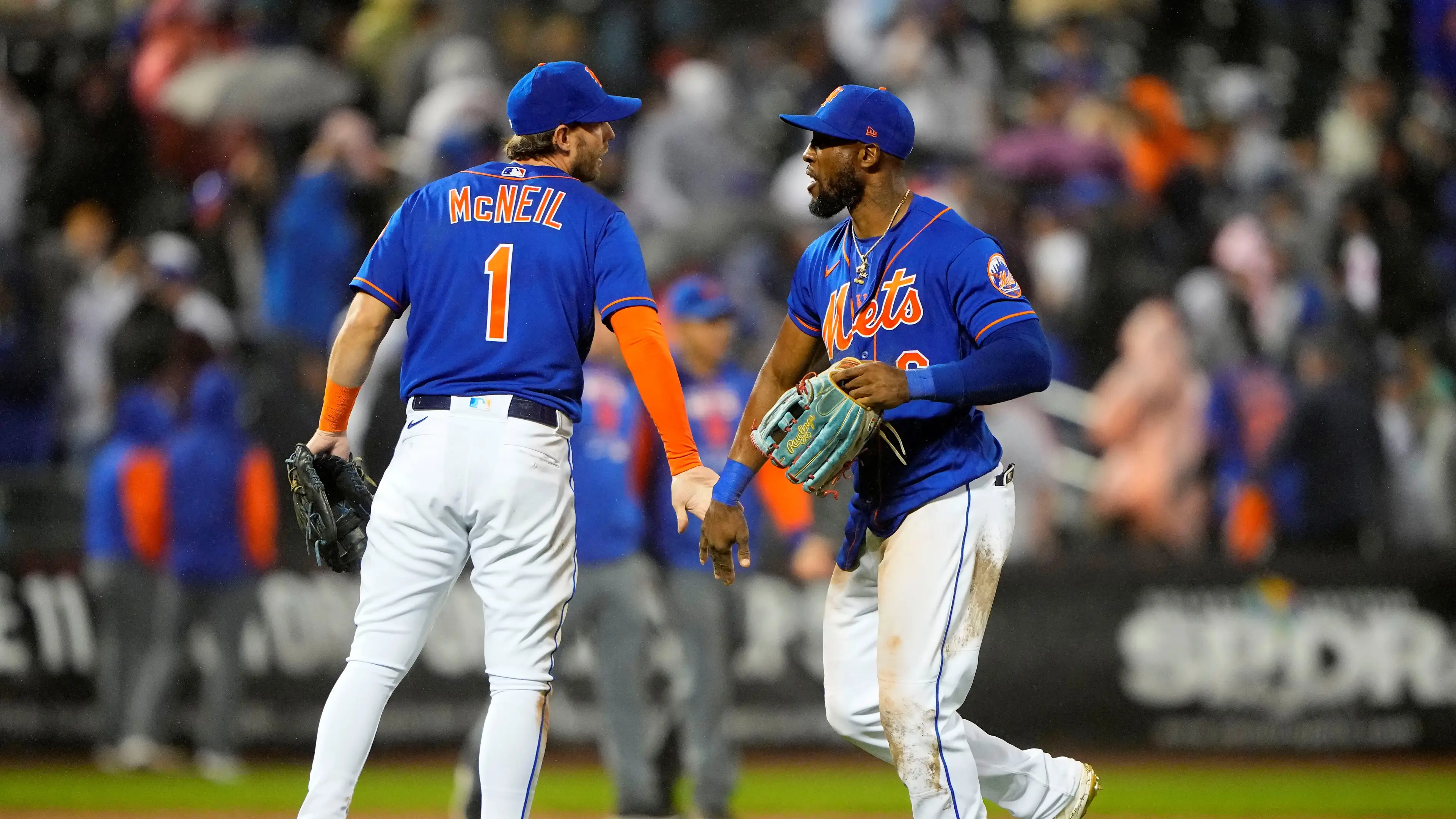 May 14, 2022; New York City, New York, USA; New York Mets second baseman Jeff McNeil (1) and New York Mets right fielder Starling Marte (6) celebrate after defeating the Seattle Mariners at Citi Field. / Gregory Fisher-USA TODAY Sports