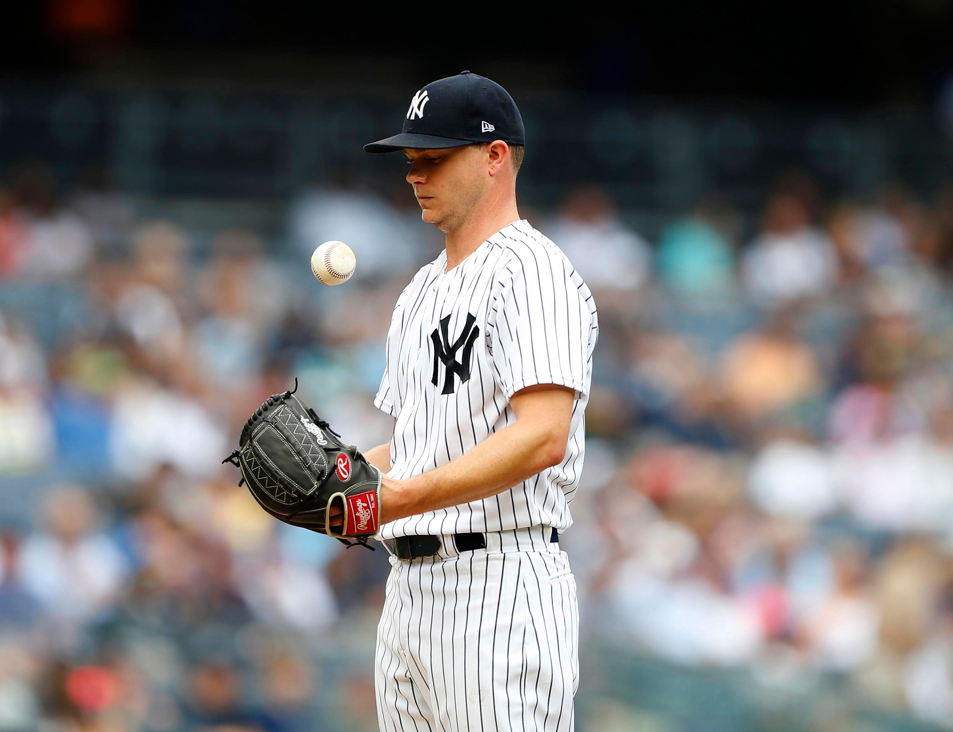 Aug 1, 2018; Bronx, NY, USA; New York Yankees starting pitcher Sonny Gray (55) reacts after giving up runs in the second inning against the Baltimore Orioles at Yankee Stadium. Mandatory Credit: Noah K. Murray-USA TODAY Sports 