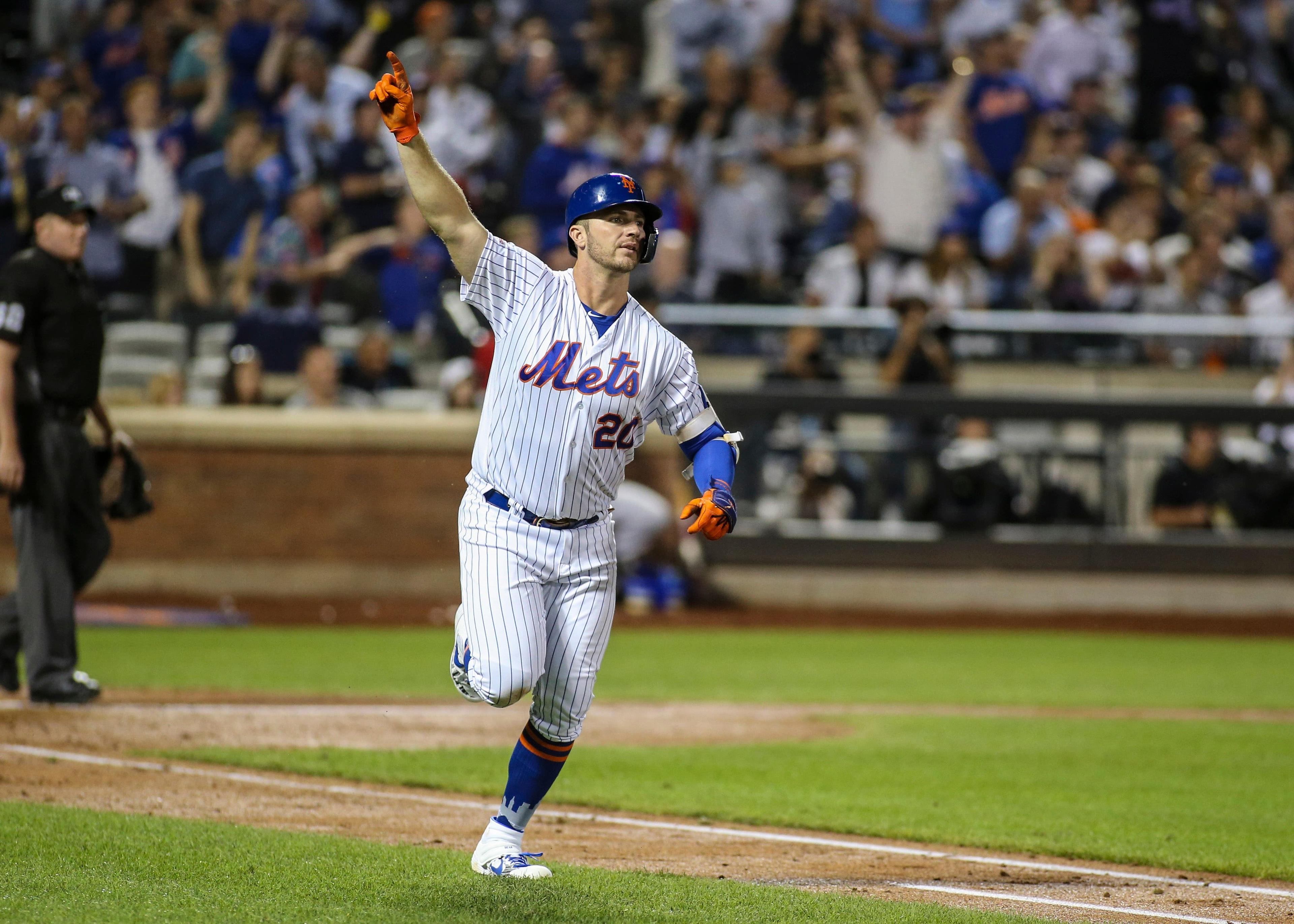 Aug 27, 2019; New York City, NY, USA; New York Mets first baseman Pete Alonso (20) runs the bases celebrating his solo home run in the fourth inning setting the Mets all time single season home run record against the Chicago Cubs at Citi Field. Mandatory Credit: Wendell Cruz-USA TODAY Sports / Wendell Cruz