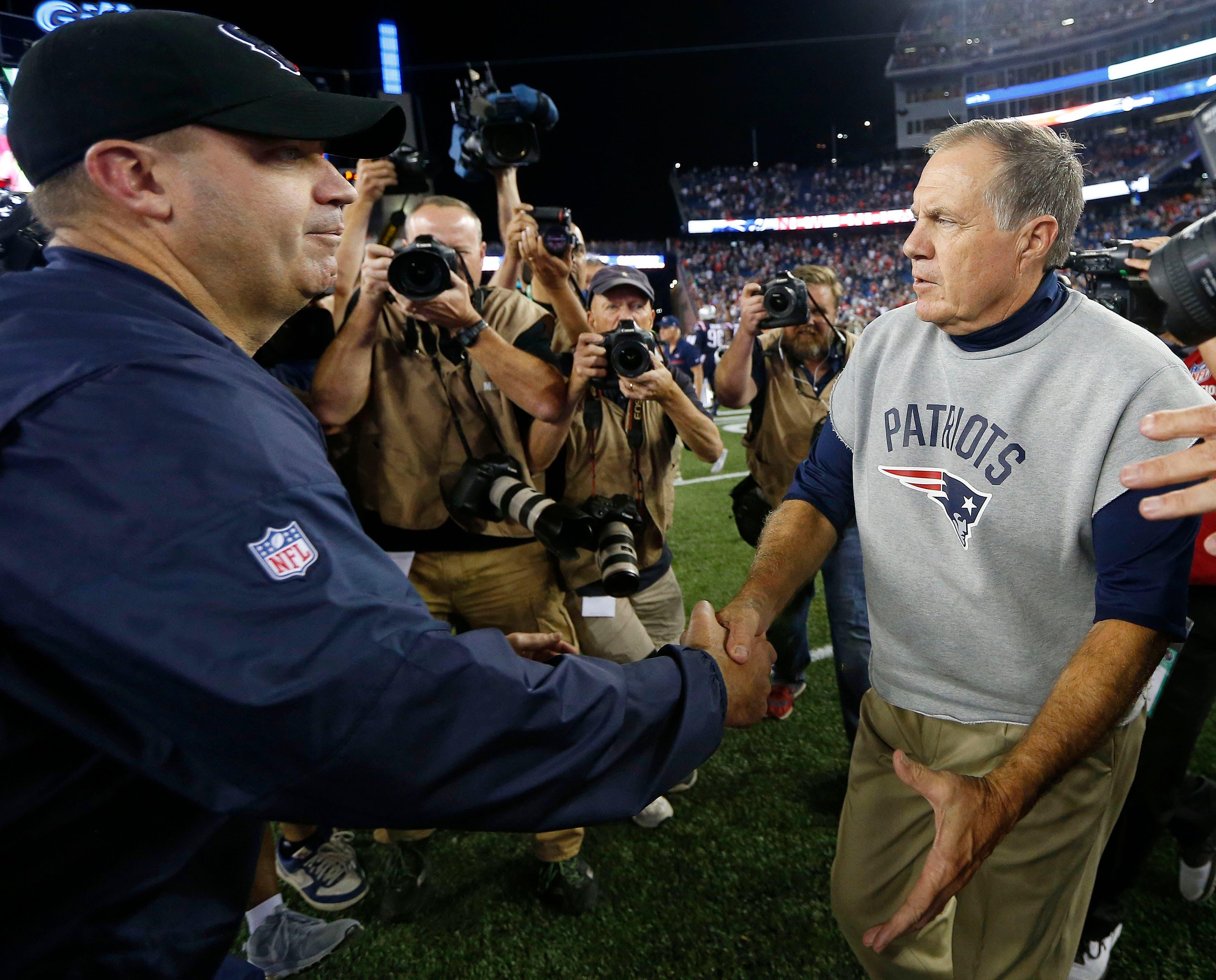 Sep 22, 2016; Foxborough, MA, USA; New England Patriots head coach Bill Belichick (right) shakes hands with Houston Texans head coach Bill O'Brien after the Patriots 27-0 win over the Texans at Gillette Stadium. Mandatory Credit: Winslow Townson-USA TODAY Sports / Winslow Townson