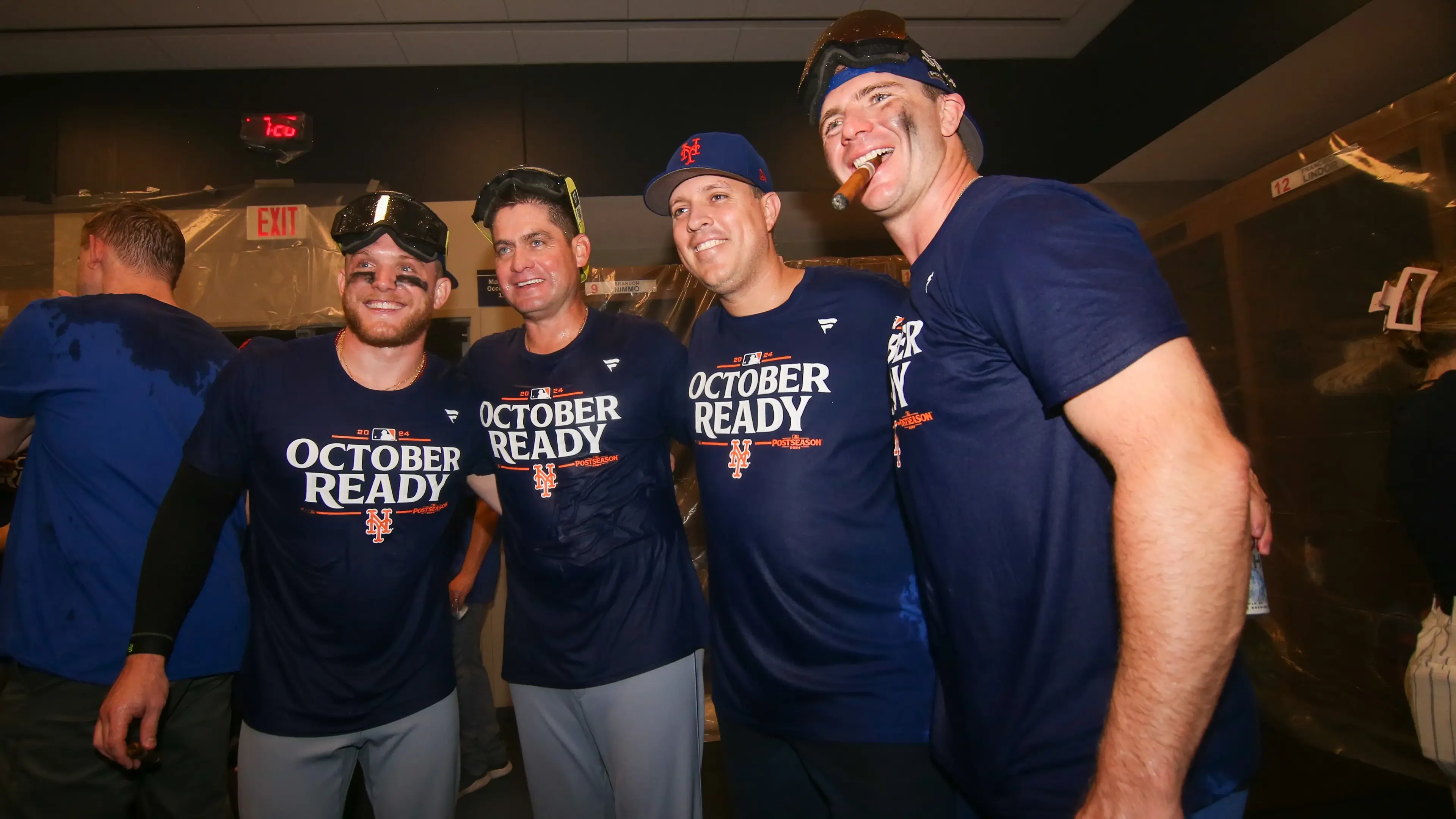 Sep 30, 2024; Atlanta, Georgia, USA; New York Mets center fielder Harrison Bader (44) and manager Carlos Mendoza (64) and first baseman Pete Alonso (20) celebrate clinching a wild card playoff birth after a game against the Atlanta Braves at Truist Park. Mandatory Credit: Brett Davis-Imagn Images / © Brett Davis-Imagn Images