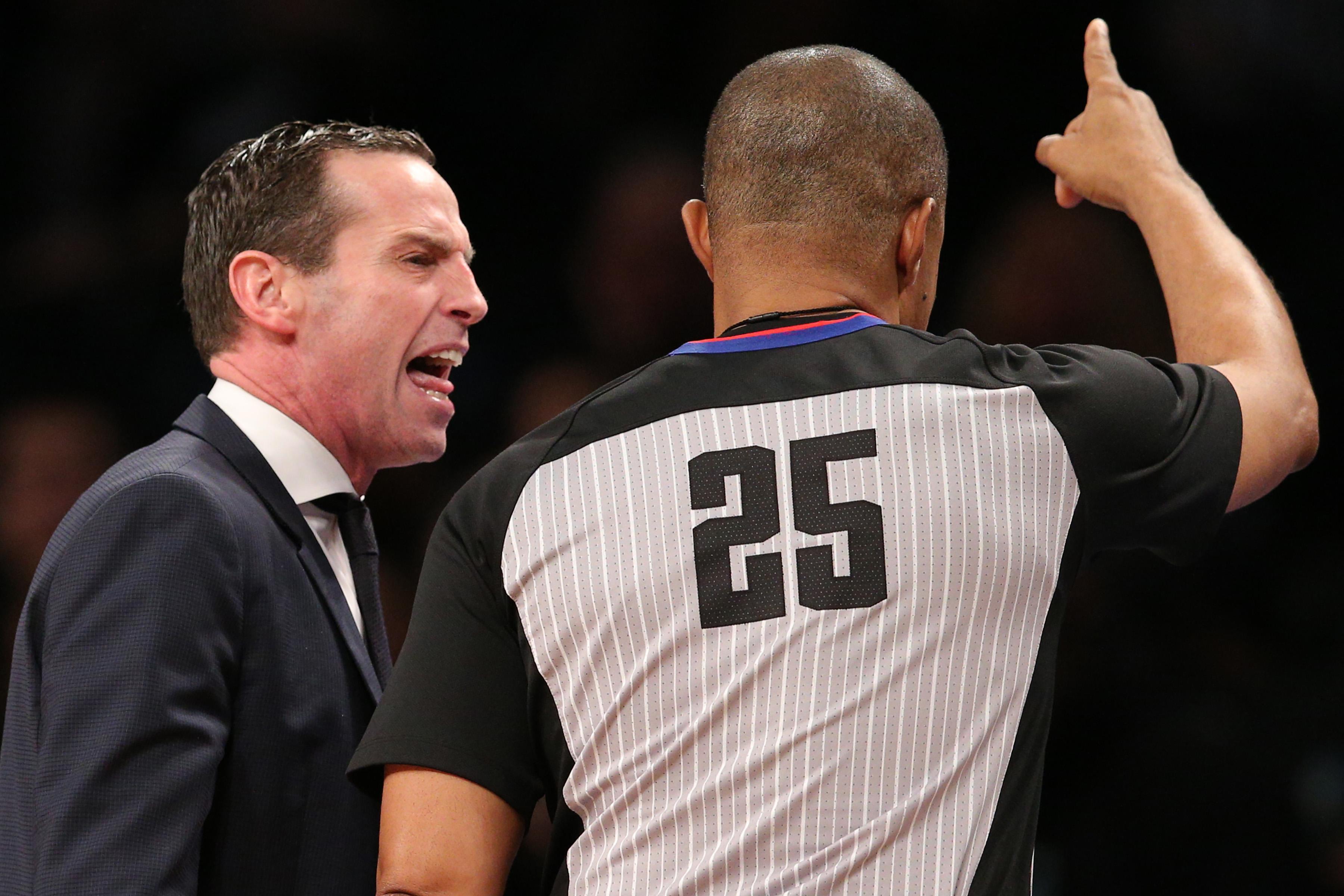 Dec 21, 2018; Brooklyn, NY, USA; Brooklyn Nets head coach Kenny Atkinson yells at referee Tony Brothers (25) during the fourth quarter against the Indiana Pacers at Barclays Center. Mandatory Credit: Brad Penner-USA TODAY Sports