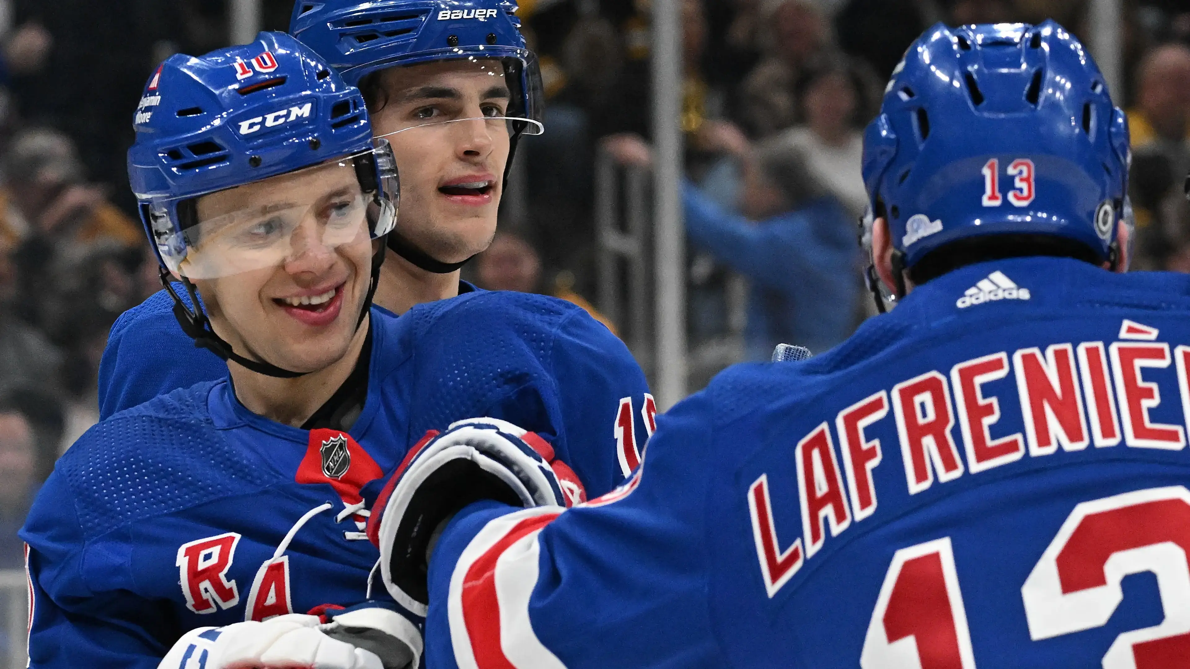 New York Rangers left wing Artemi Panarin (10) celebrates with New York Rangers left wing Alexis Lafreniere (13) after scoring a goal against the Boston Bruins during the second period at the TD Garden / Brian Fluharty - USA TODAY Sports