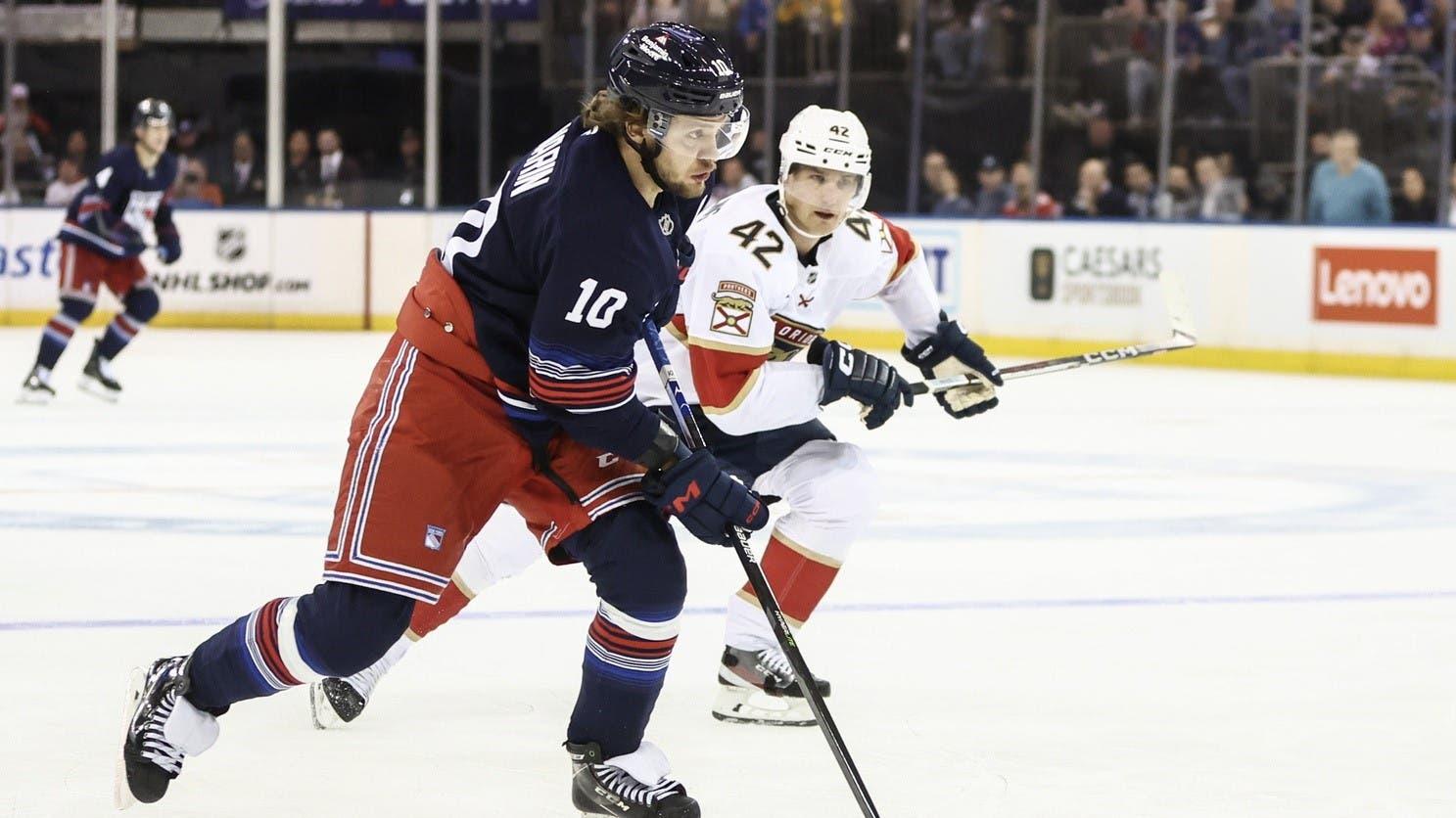 Oct 24, 2024; New York, New York, USA; New York Rangers left wing Artemi Panarin (10) attempts a shot on goal in the second period against the Florida Panthers at Madison Square Garden. / Wendell Cruz-Imagn Images