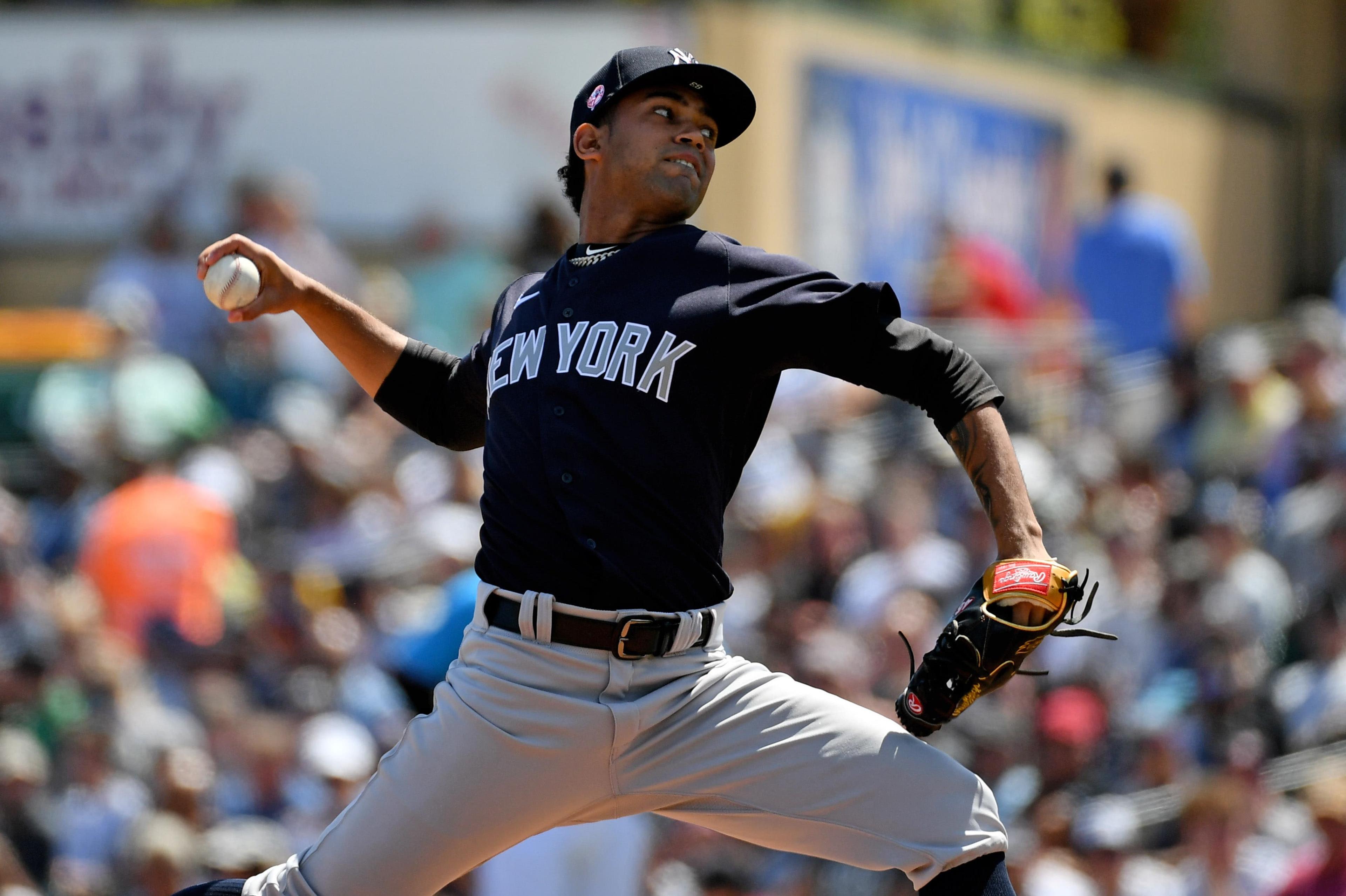 Mar 11, 2020; Jupiter, Florida, USA; New York Yankees starting pitcher Deivi Garcia (83) delivers a pitch in the first inning of the spring training game against the Miami Marlins at Roger Dean Chevrolet Stadium. Mandatory Credit: Jasen Vinlove-USA TODAY Sports / Jasen Vinlove