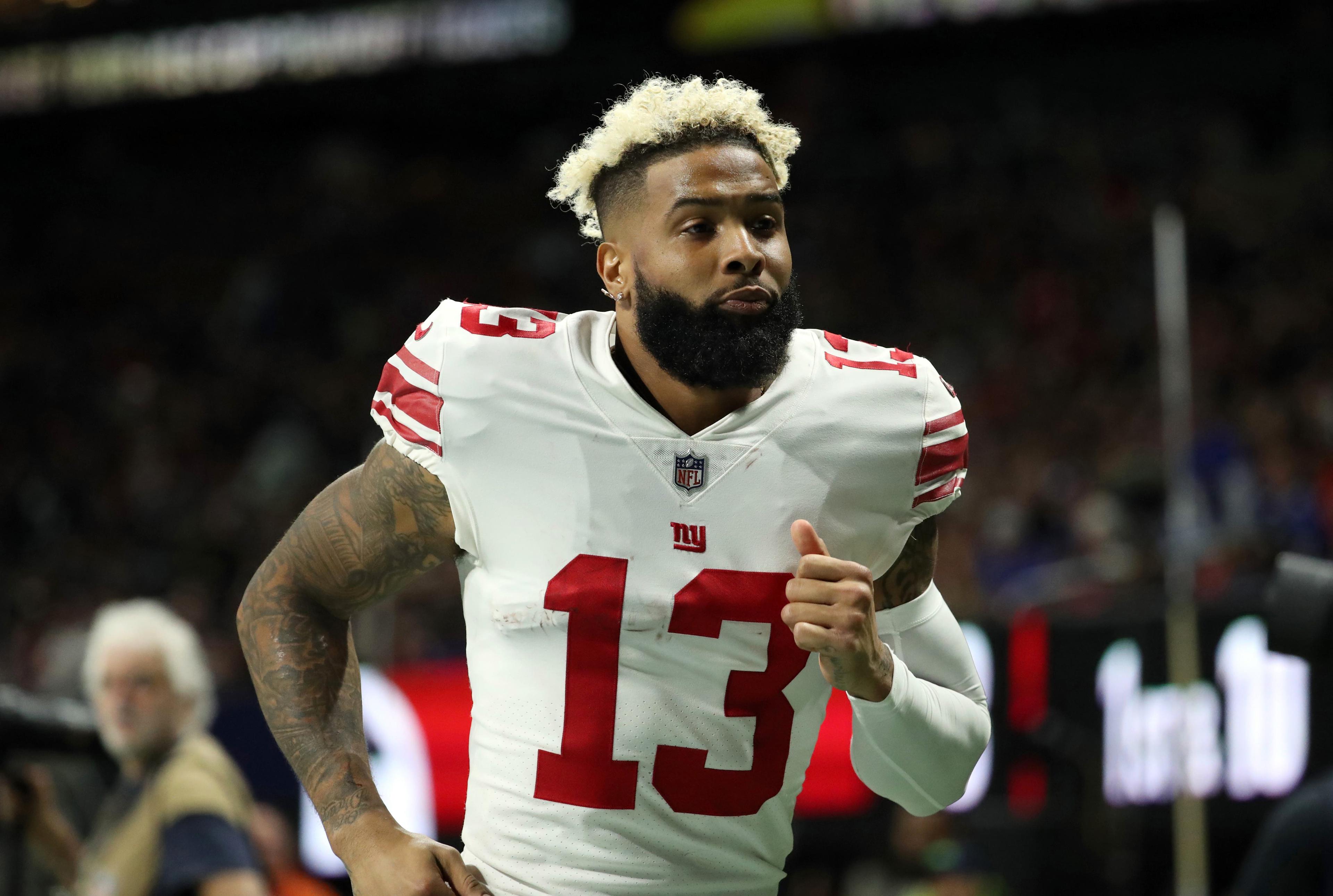 Oct 22, 2018; Atlanta, GA, USA; New York Giants wide receiver Odell Beckham (13) runs to the locker room during the fourth quarter against the Atlanta Falcons at Mercedes-Benz Stadium. Mandatory Credit: Jason Getz-USA TODAY Sports / Jason Getz