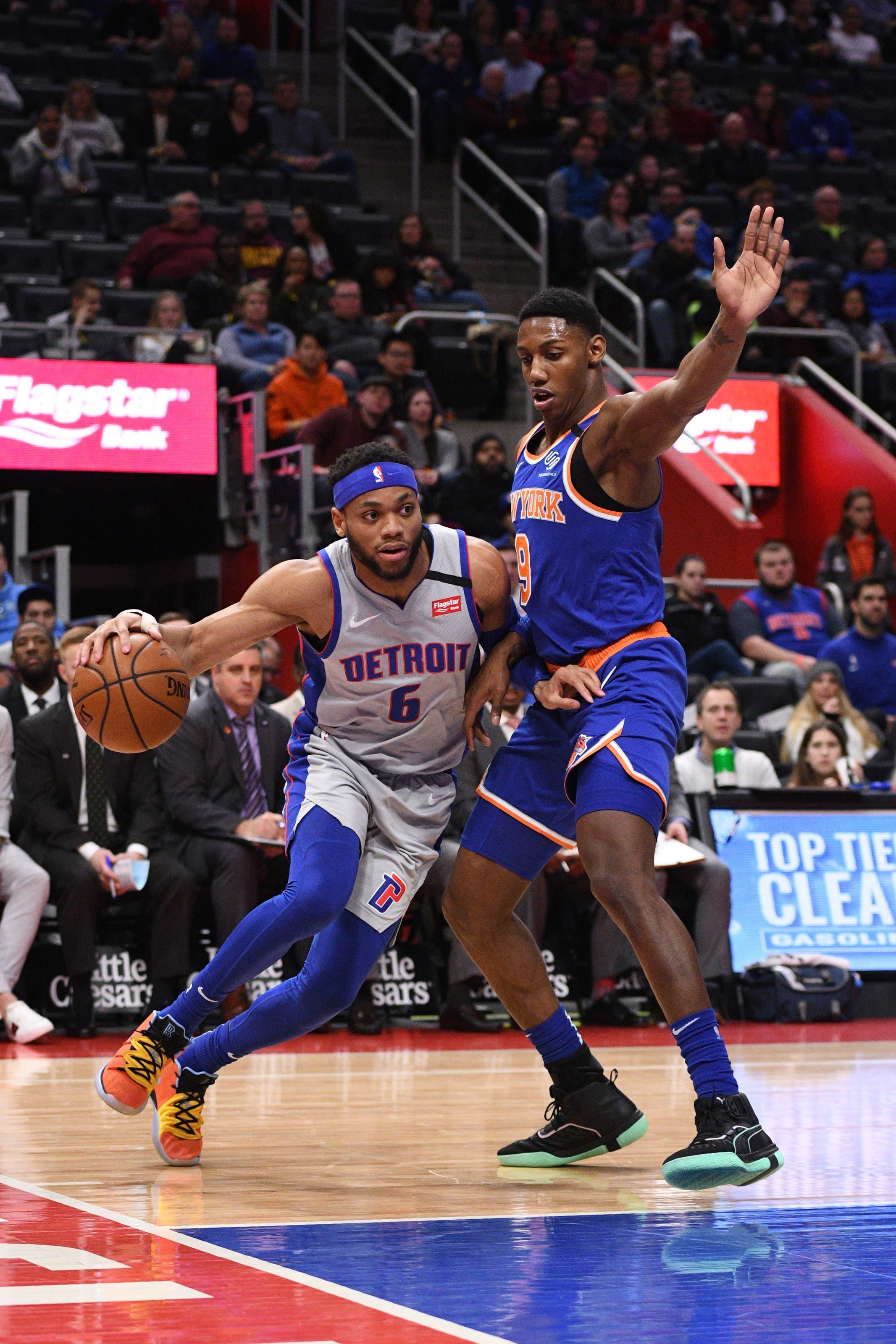 Feb 8, 2020; Detroit, Michigan, USA; Detroit Pistons guard Bruce Brown (6) drives to the basket as New York Knicks guard RJ Barrett (9) defends during the first quarter at Little Caesars Arena. Mandatory Credit: Tim Fuller-USA TODAY Sports / Tim Fuller