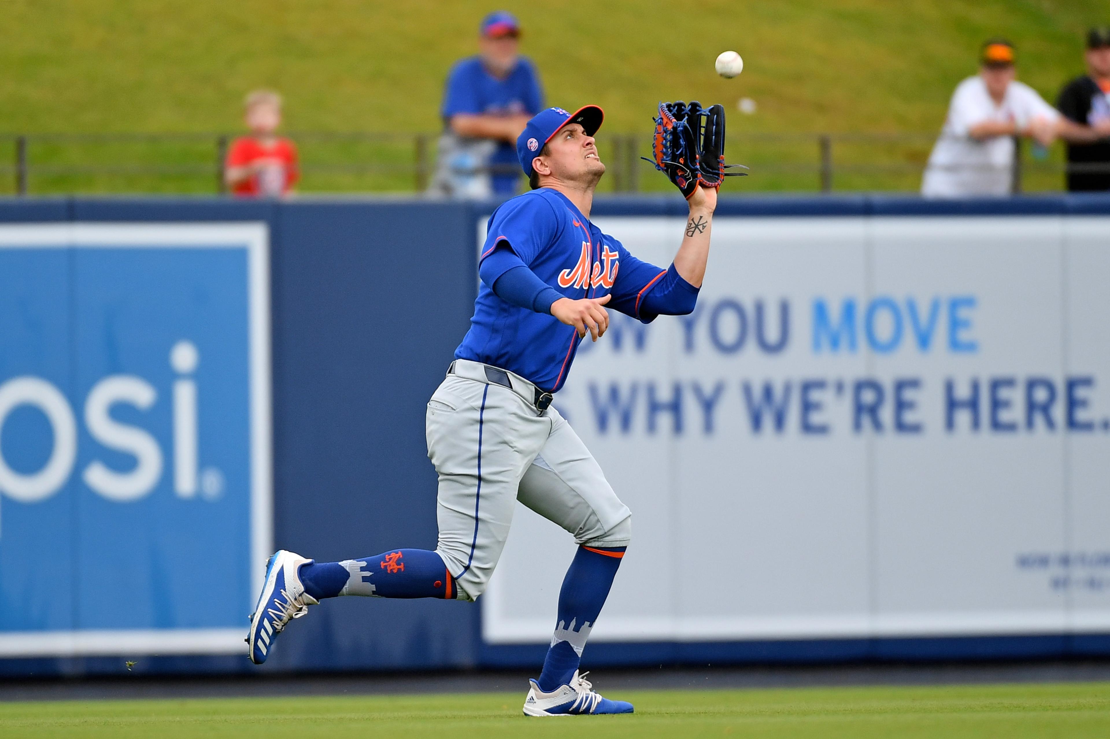 Mar 10, 2020; West Palm Beach, Florida, USA; New York Mets left fielder J.D. Davis (28) makes a catch for an out on the pop fly of Houston Astros catcher Garrett Stubbs (11, not pictured) in the seconf inning of the spring training game at FITTEAM Ballpark of the Palm Beaches. Mandatory Credit: Jasen Vinlove-USA TODAY Sports