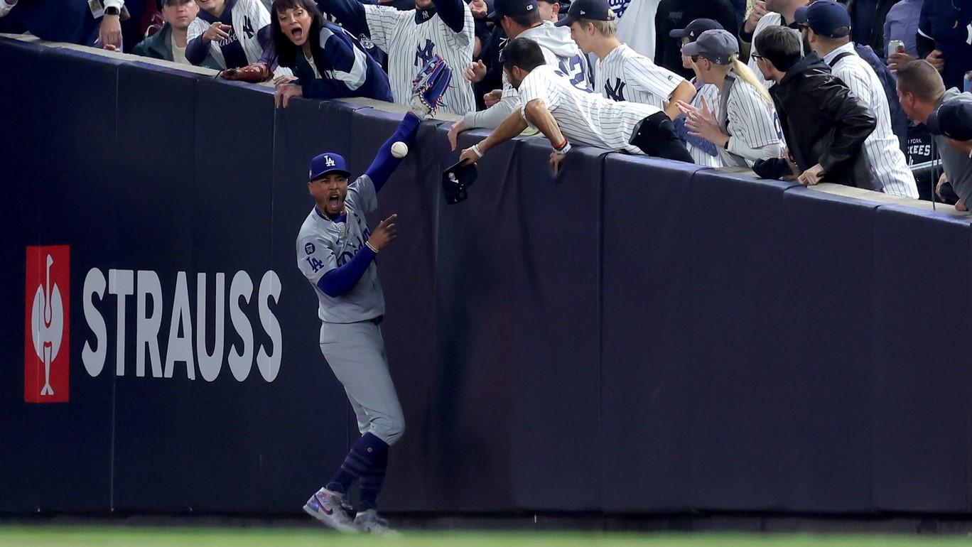 SEE IT: Yankees fans grab Mookie Betts' arm as Dodgers outfielder makes catch in World Series Game 4