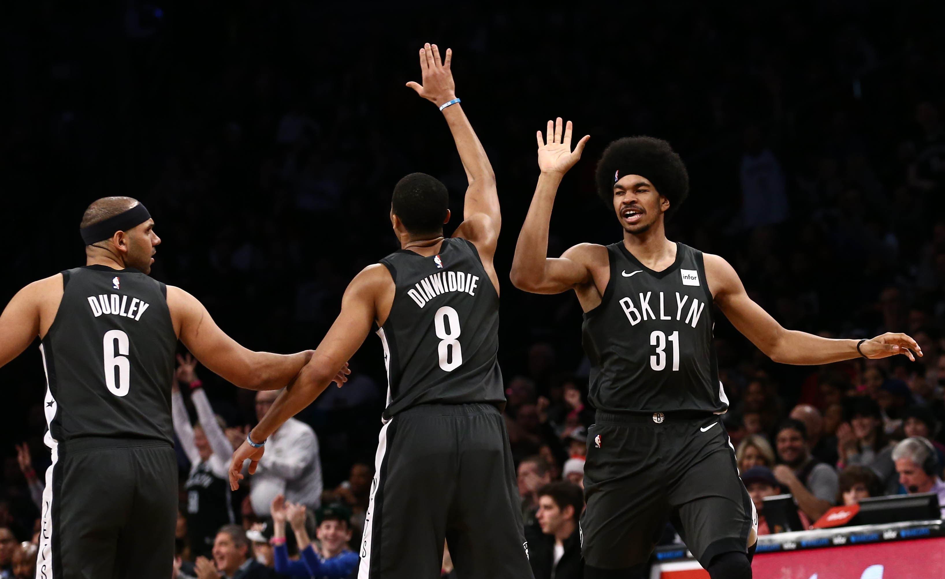 Brooklyn Nets forward Jared Dudley and guard Spencer Dinwiddie and center Jarrett Allen react in the first quarter against the Phoenix Suns at Barclays Center. / Nicole Sweet/USA TODAY Sports