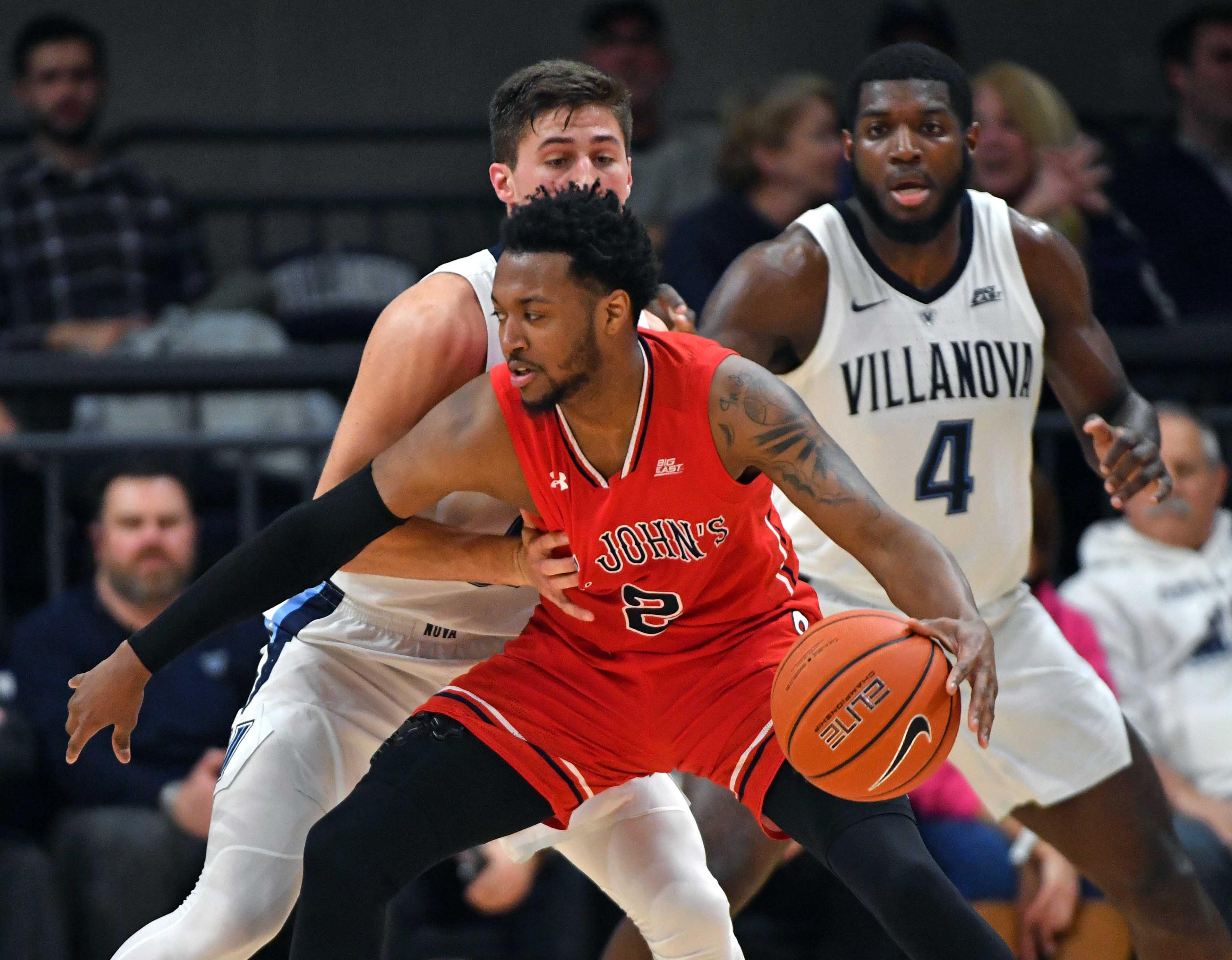 Jan 8, 2019; Villanova, PA, USA; St. John's Red Storm guard Shamorie Ponds (2) drives to the basket against Villanova Wildcats guard Collin Gillespie (2) during the first half at Finneran Pavilion. Mandatory Credit: Eric Hartline-USA TODAY Sports