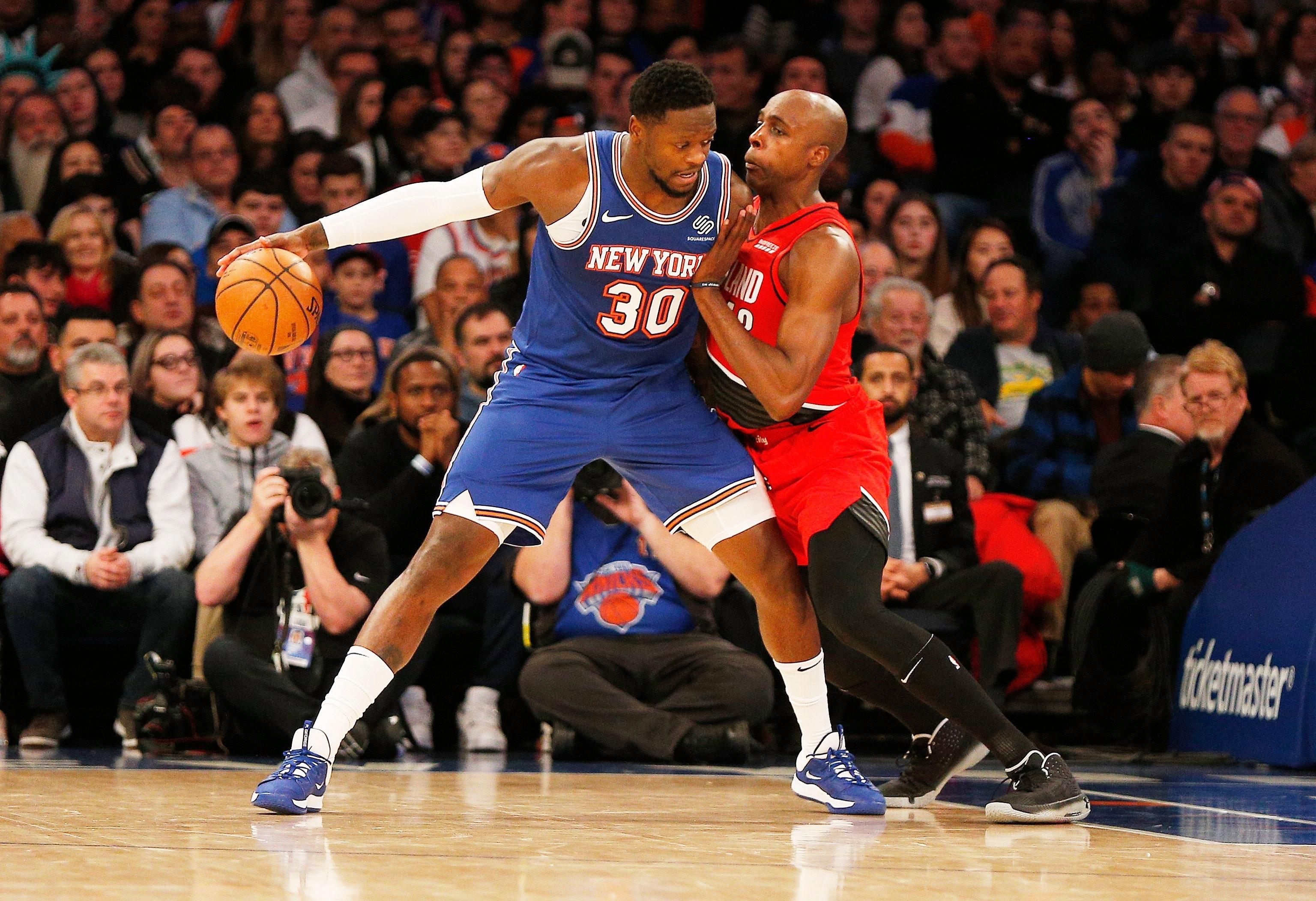 Jan 1, 2020; New York, New York, USA; New York Knicks forward Julius Randle (30) dribbles the ball against Portland Trail Blazers forward Anthony Tolliver (43) during the first half at Madison Square Garden. Mandatory Credit: Andy Marlin-USA TODAY Sports