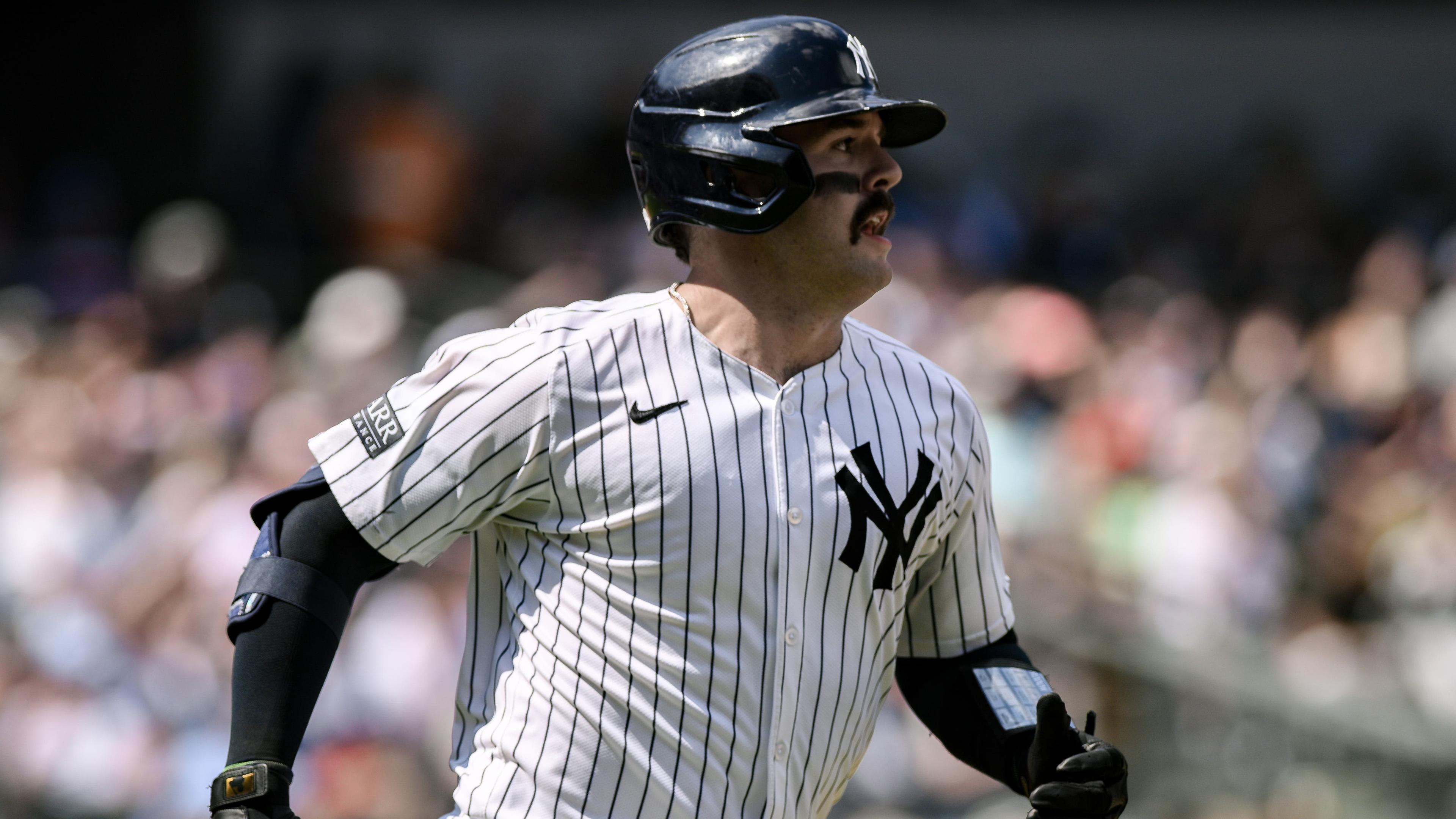 New York Yankees catcher Austin Wells (28) hits a two RBI single against the Texas Rangers during the fourth inning at Yankee Stadium / John Jones - USA TODAY Sports