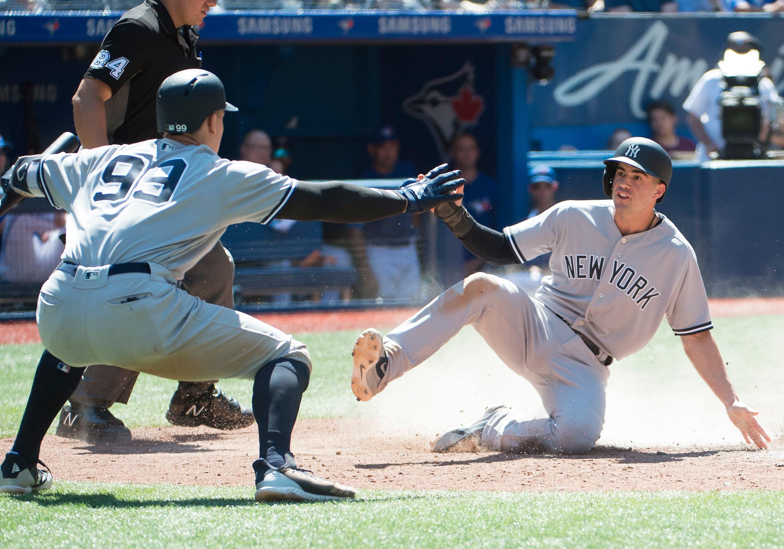 Tyler Wade (12) Aaron Judge (99) Mandatory Credit: Nick Turchiaro-USA TODAY Sports