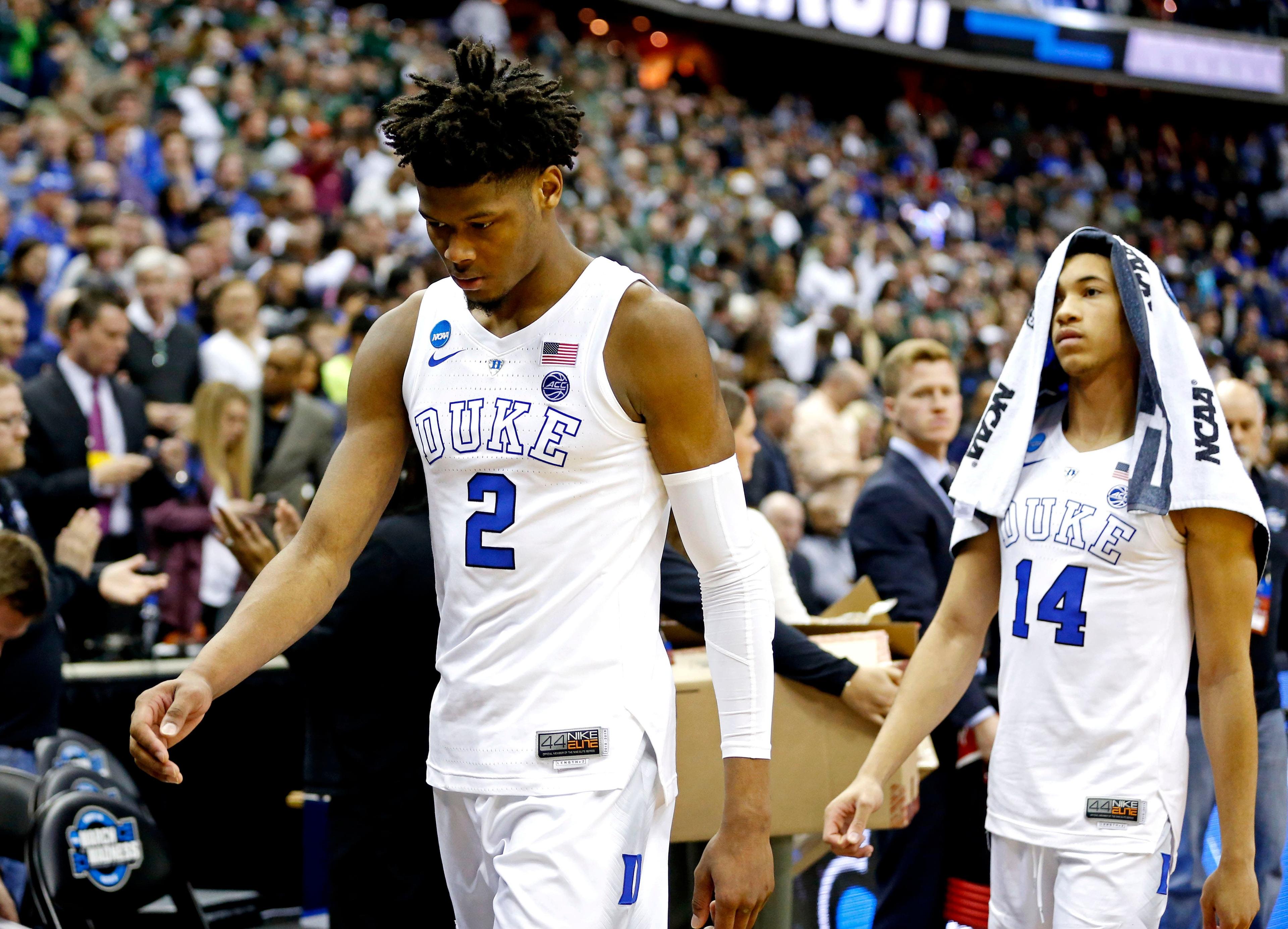 Mar 31, 2019; Washington, DC, USA; Duke Blue Devils forward Cam Reddish (2) and guard Jordan Goldwire (14) walk off the court ofter losing to the Michigan State Spartans in the championship game of the east regional of the 2019 NCAA Tournament at Capital One Arena. Mandatory Credit: Amber Searls-USA TODAY Sports / Amber Searls