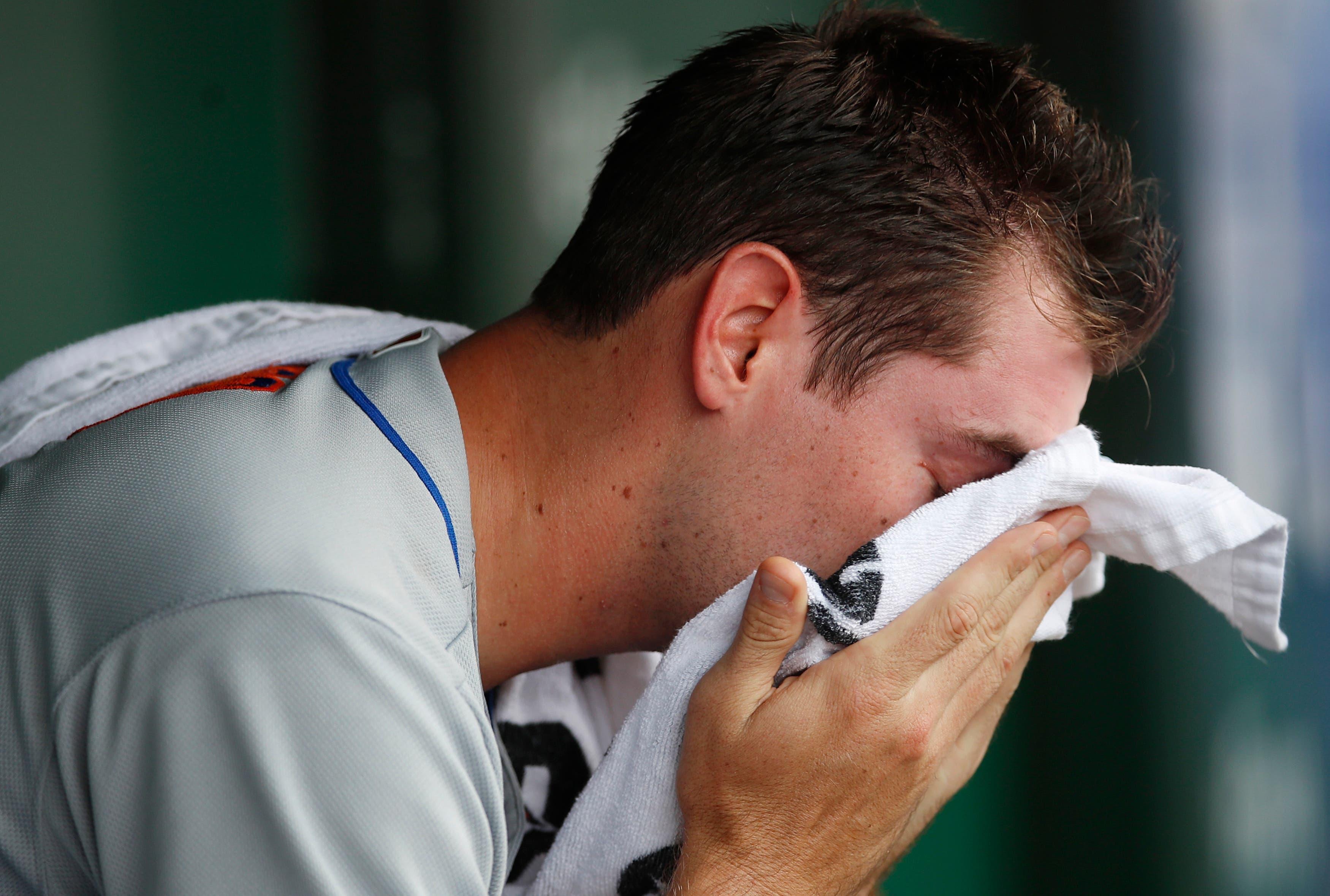 Jun 23, 2019; Chicago, IL, USA; New York Mets starting pitcher Seth Lugo (67) reacts in the dugout after giving up a three-run home run to Chicago Cubs shortstop Javier Baez (9) during the eighth inning at Wrigley Field. Mandatory Credit: Jim Young-USA TODAY Sports / Jim Young