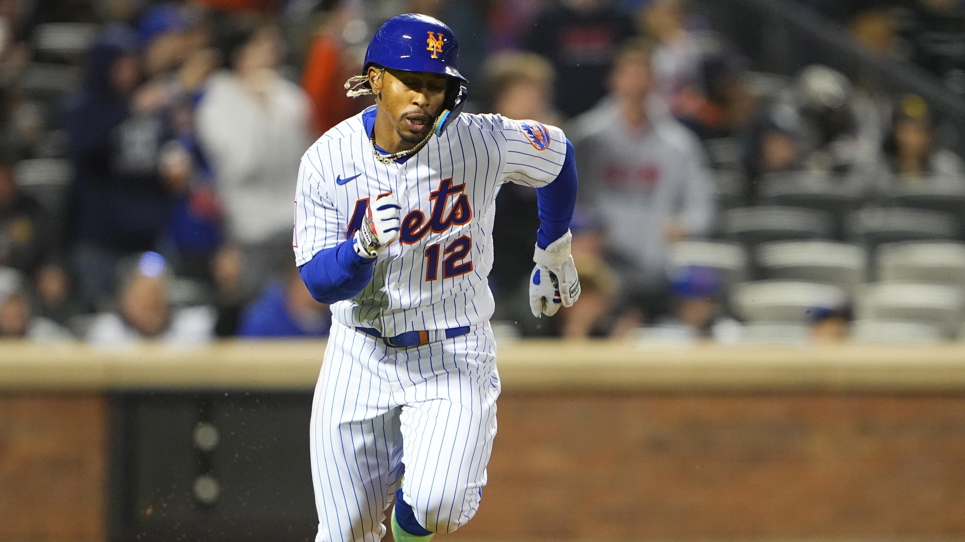 New York Mets shortstop Francisco Lindor (12) runs out an RBI double against the San Diego Padres during the seventh inning at Citi Field / Gregory Fisher - USA TODAY Sports