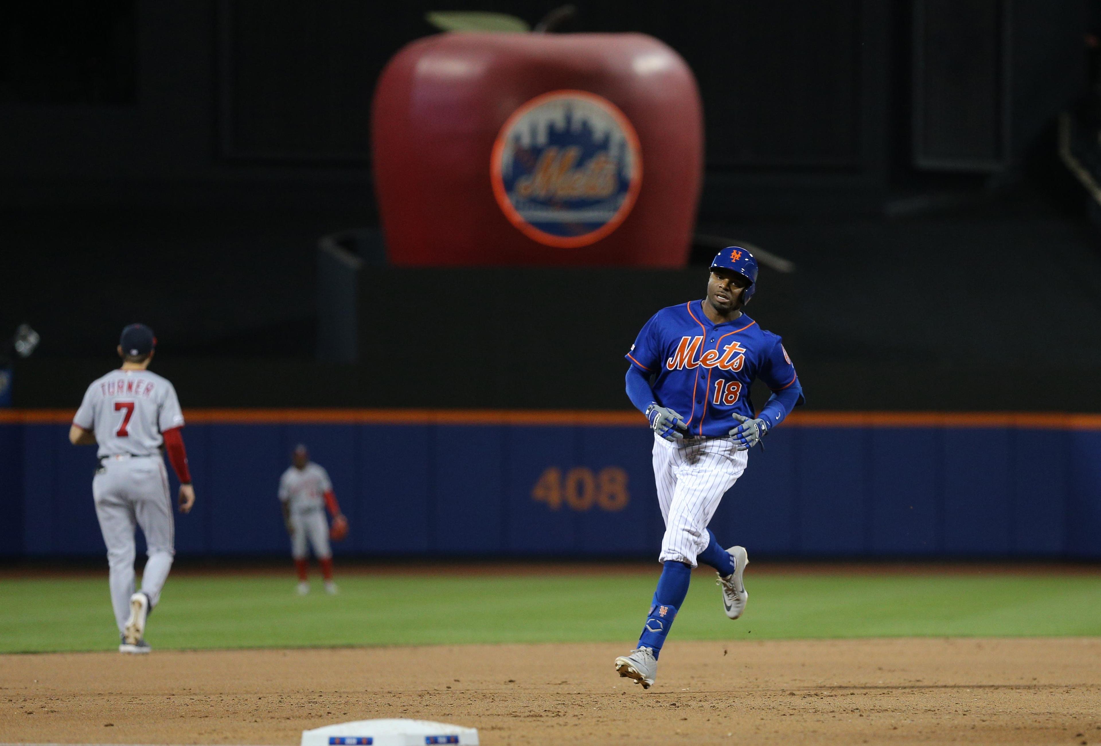 May 22, 2019; New York City, NY, USA; New York Mets pinch hitter Rajai Davis (18) rounds the bases after hitting a three run home run against the Washington Nationals during the eighth inning at Citi Field. Mandatory Credit: Brad Penner-USA TODAY Sports / Brad Penner