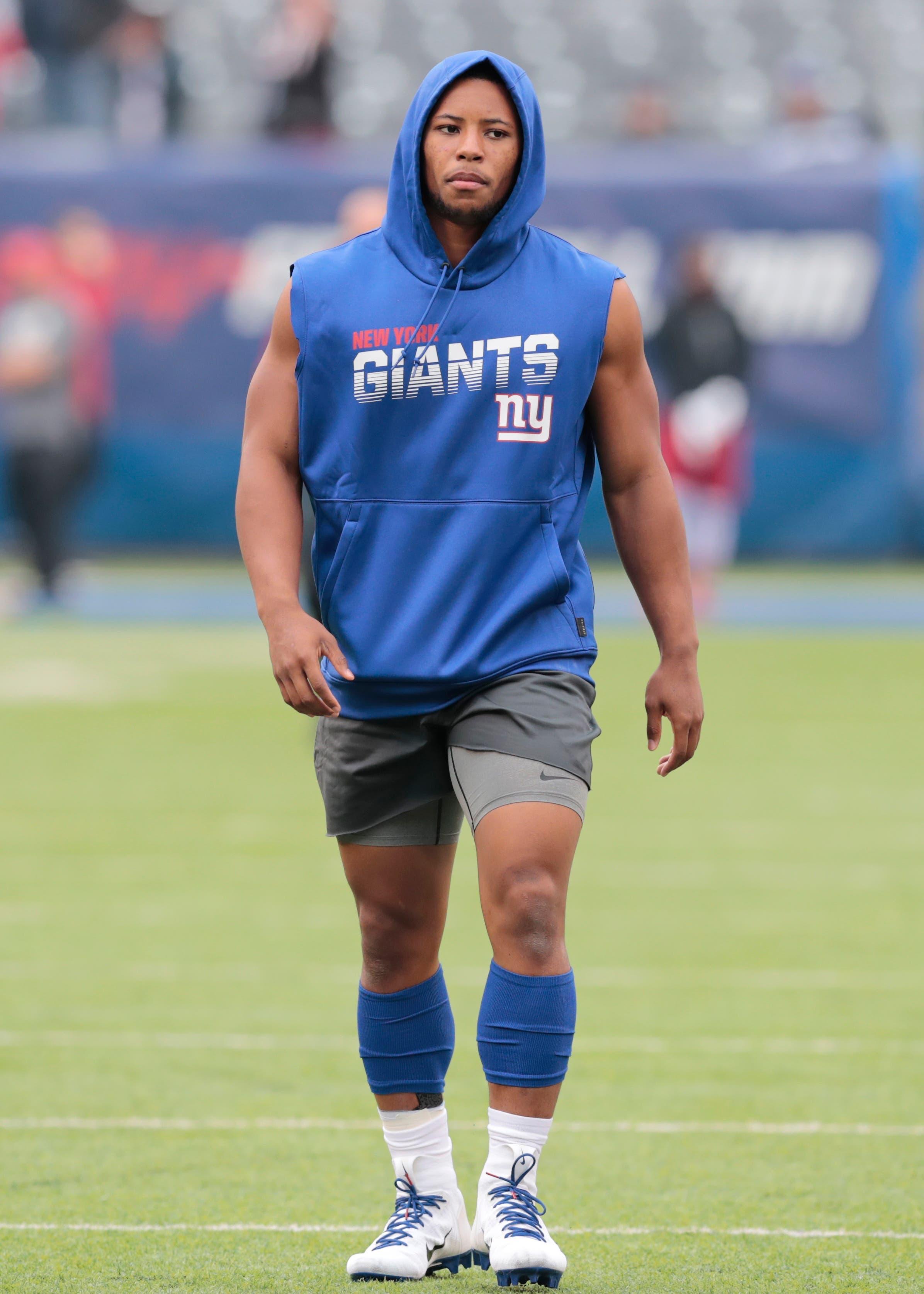 Oct 20, 2019; East Rutherford, NJ, USA; New York Giants running back Saquon Barkley (26) warms up before his game against the Arizona Cardinals at MetLife Stadium. Mandatory Credit: Vincent Carchietta-USA TODAY Sports / Vincent Carchietta