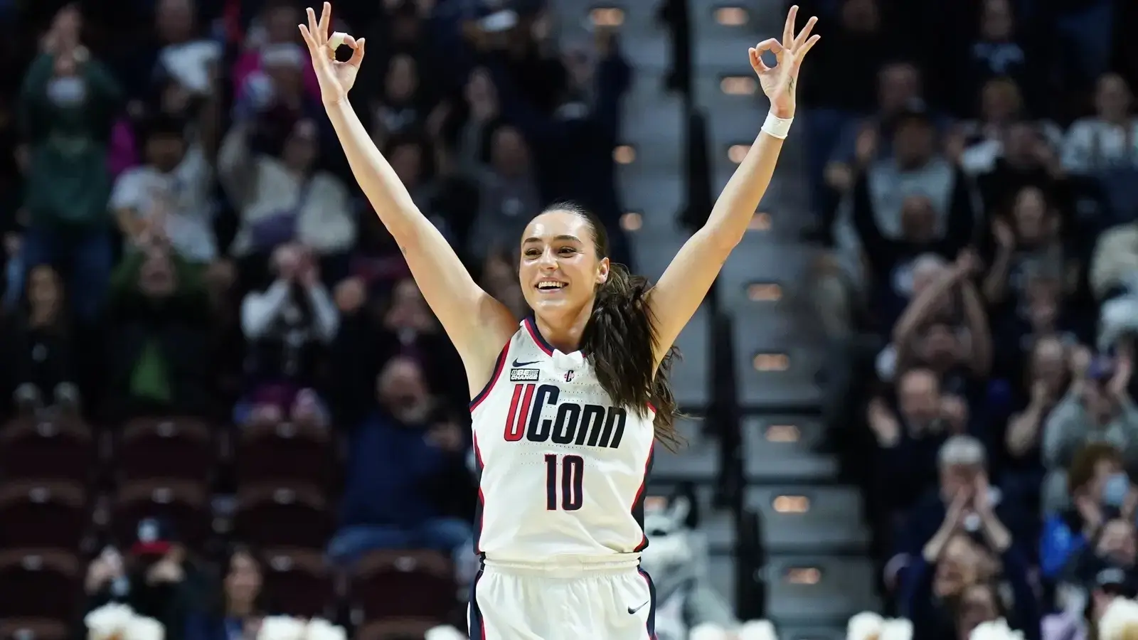 UConn Huskies guard Nika Muhl (10) reacts after a three point basket against the Georgetown Hoyas in the first half at Mohegan Sun Arena. / David Butler II-USA TODAY Sports