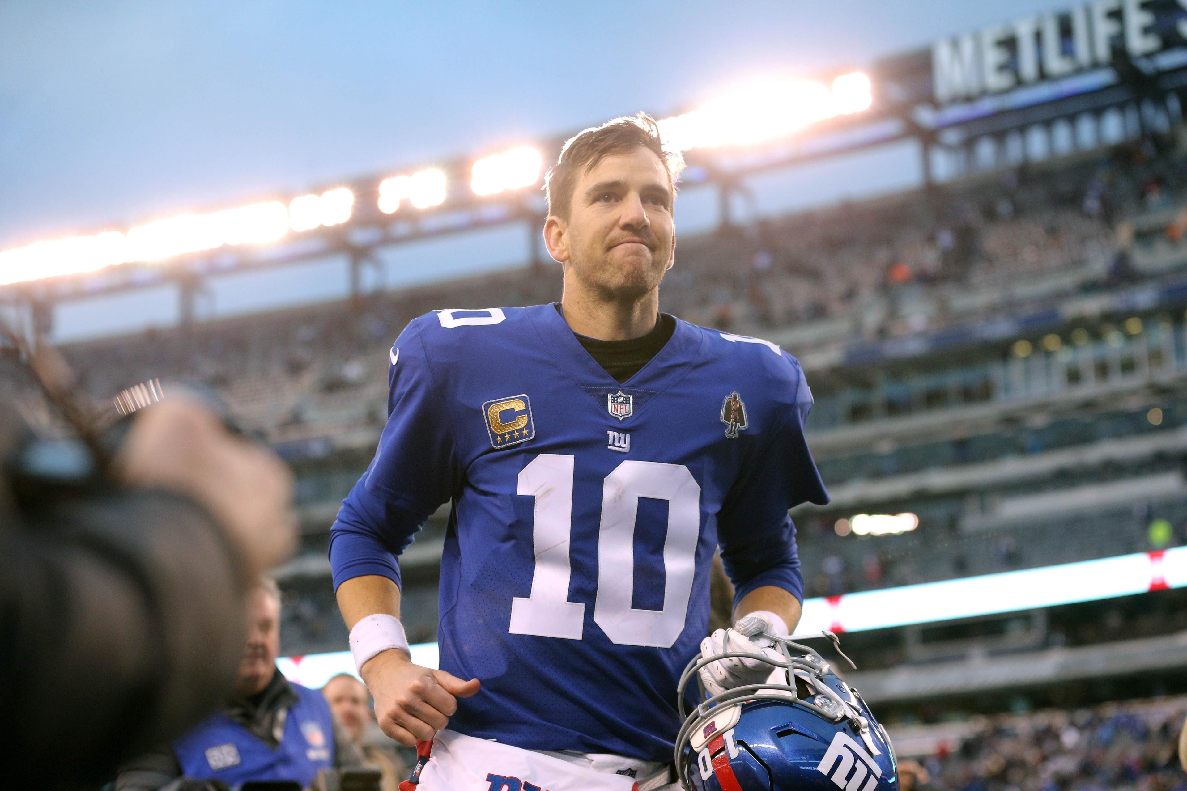 Dec 30, 2018; East Rutherford, NJ, USA; New York Giants quarterback Eli Manning (10) leaves the field after losing to the Dallas Cowboys at MetLife Stadium. Mandatory Credit: Brad Penner-USA TODAY Sports