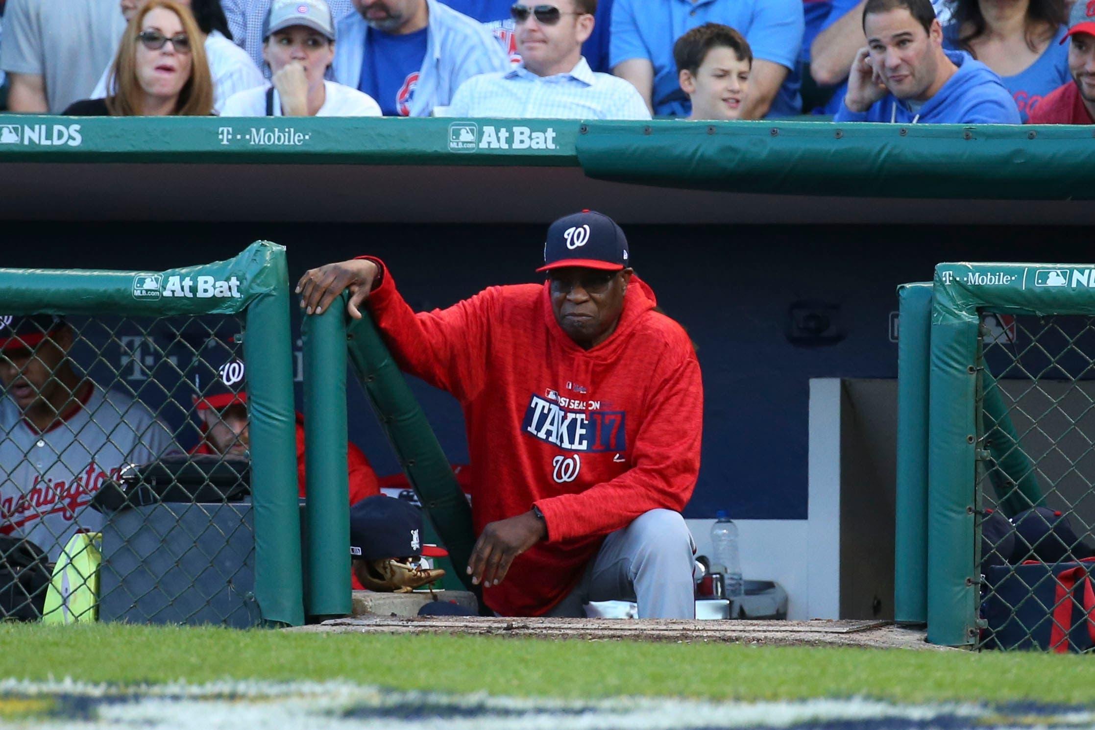 Oct 9, 2017; Chicago, IL, USA; Washington Nationals manager Dusty Baker (12) in the dugout during the sixth inning in game three of the 2017 NLDS playoff baseball series against the Chicago Cubs at Wrigley Field. Mandatory Credit: Jerry Lai-USA TODAY Sports / Jerry Lai