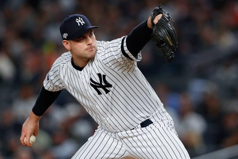 Oct 15, 2019; Bronx, NY, USA; New York Yankees relief pitcher Adam Ottavino (0) pitches during the seventh inning in game three of the 2019 ALCS playoff baseball series against the Houston Astros at Yankee Stadium. Mandatory Credit: Noah K. Murray-USA TODAY Sports / Noah K. Murray