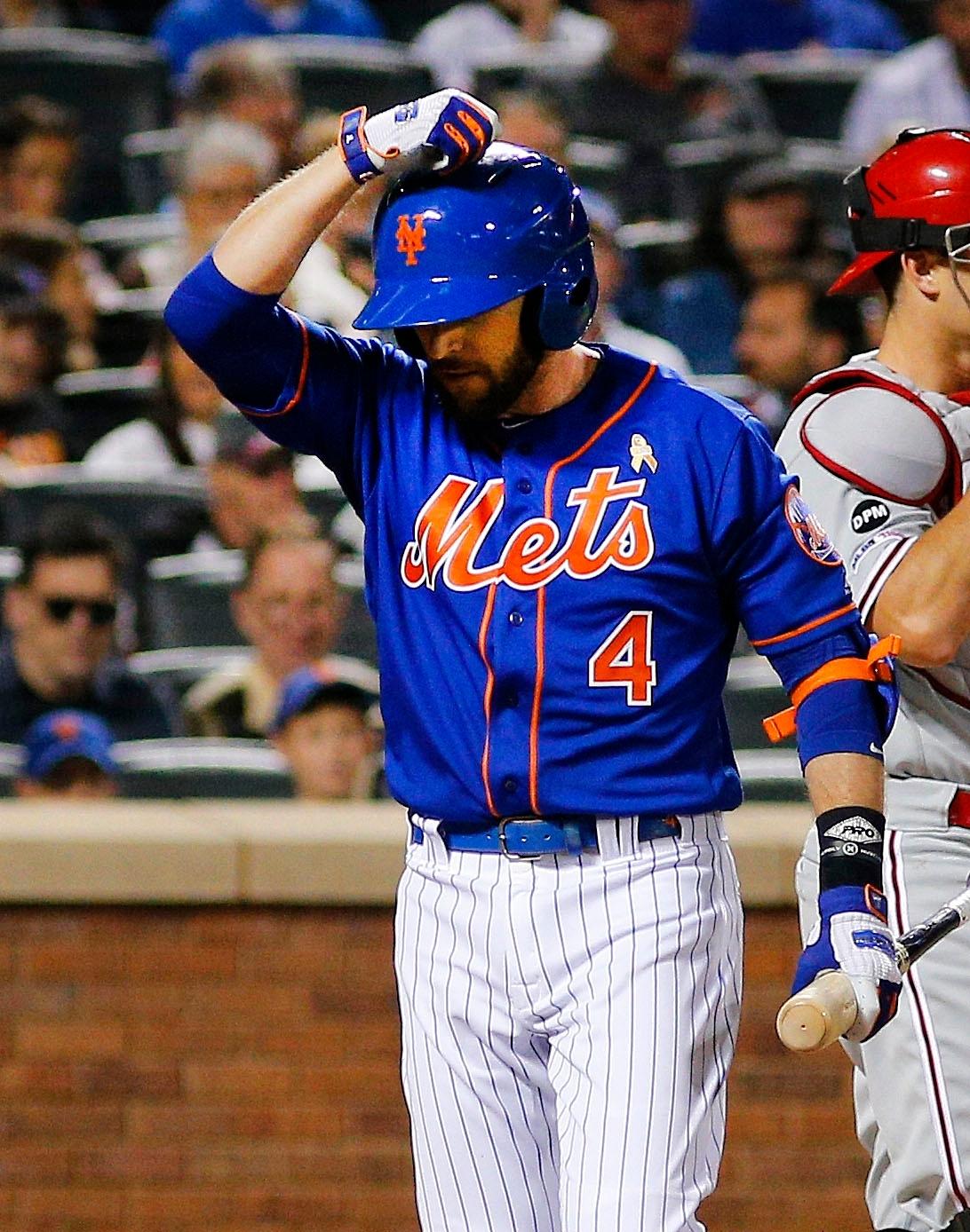 Sep 7, 2019; New York City, NY, USA; New York Mets pinch hitter Jed Lowrie (4) reacts after striking out with two men on base against the Philadelphia Phillies during the fourth
inning at Citi Field. Mandatory Credit: Andy Marlin-USA TODAY Sports