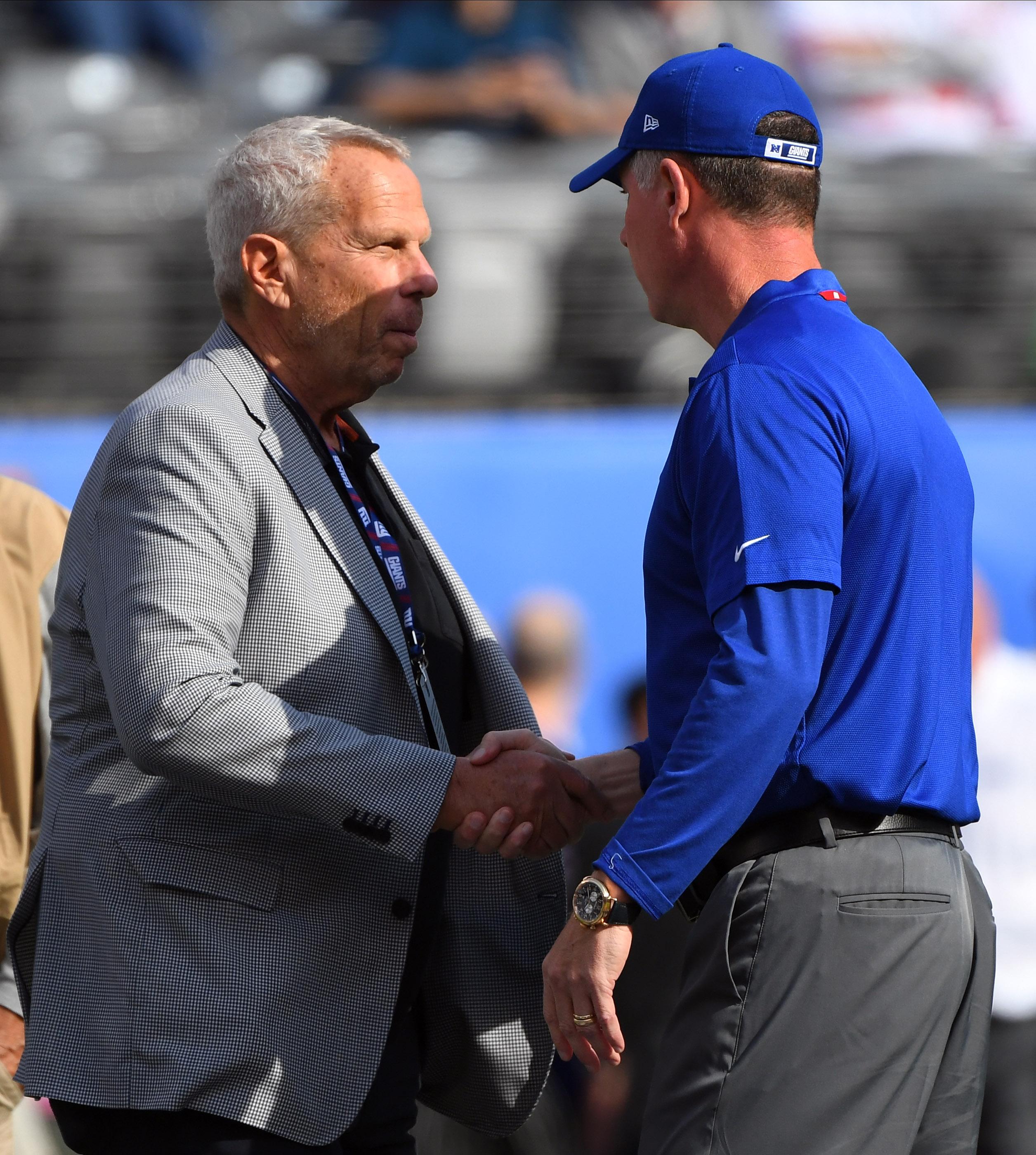 Sep 30, 2018; East Rutherford, NJ, USA; New York Giants chairman Steve Tisch talks with New York Giants head coach Pat Shurmur before their game against the New Orleans Saints at MetLife Stadium. Mandatory Credit: Robert Deutsch-USA TODAY Sports