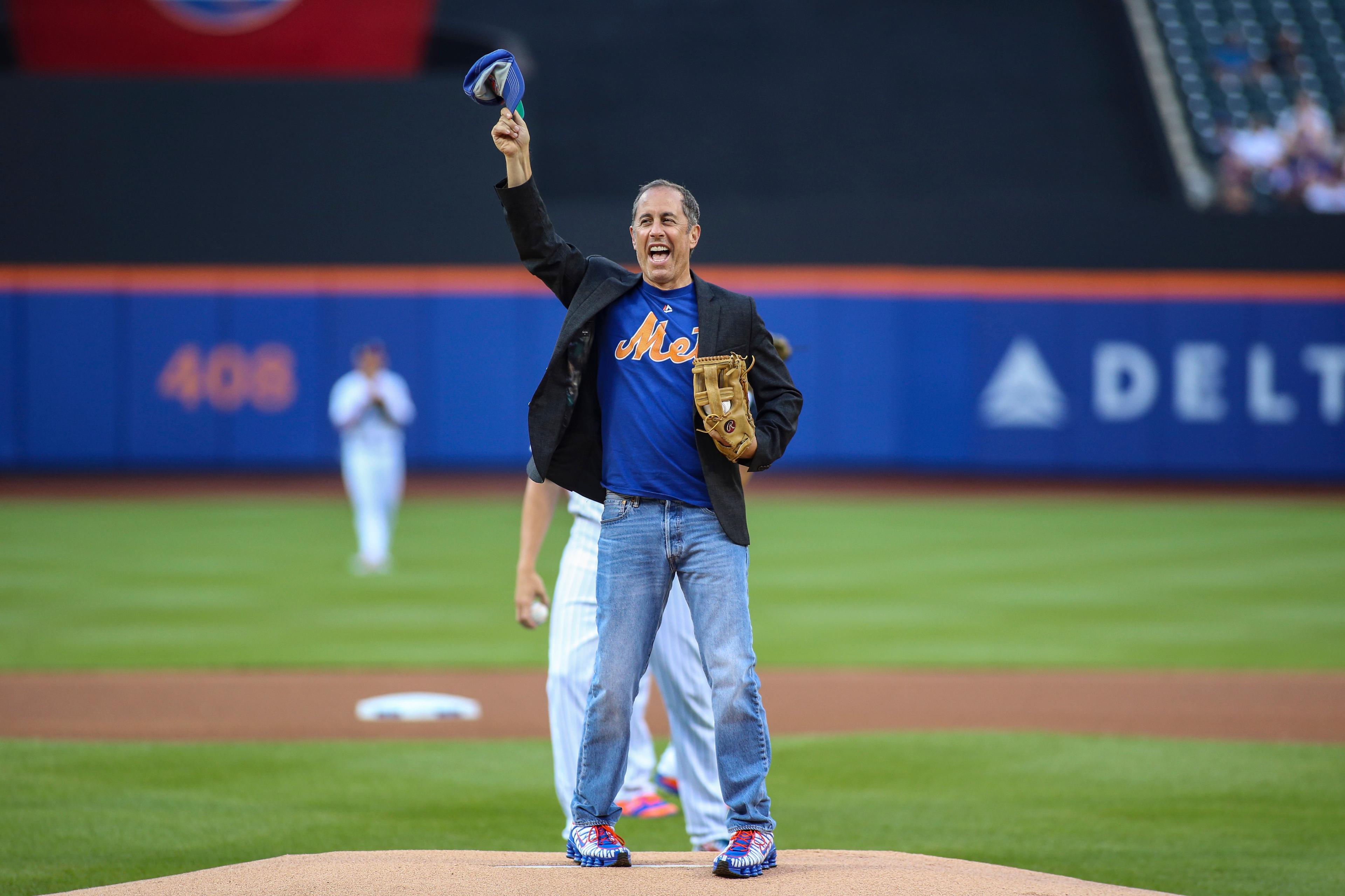 Jul 5, 2019; New York City, NY, USA; Comedian Jerry Seinfeld throws out the ceremonial first pitch prior to the start of the Philadelphia Phillies and New York Mets game at Citi Field. Mandatory Credit: Wendell Cruz-USA TODAY Sports