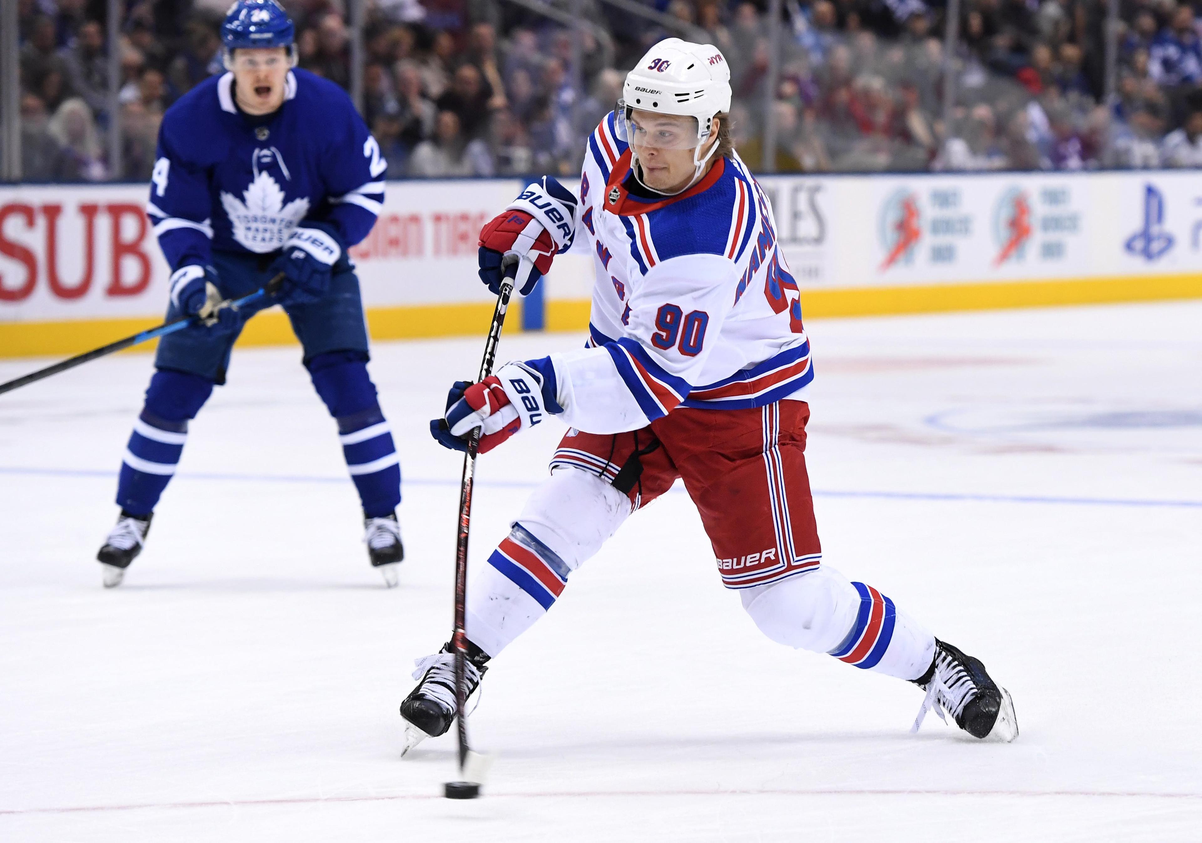 Mar 23, 2019; Toronto, Ontario, CAN; New York Rangers forward Vladislav Namestnikov (90) shoots the puck against Toronto Maple Leafs in the first period at Scotiabank Arena. Mandatory Credit: Dan Hamilton-USA TODAY Sports / Dan Hamilton