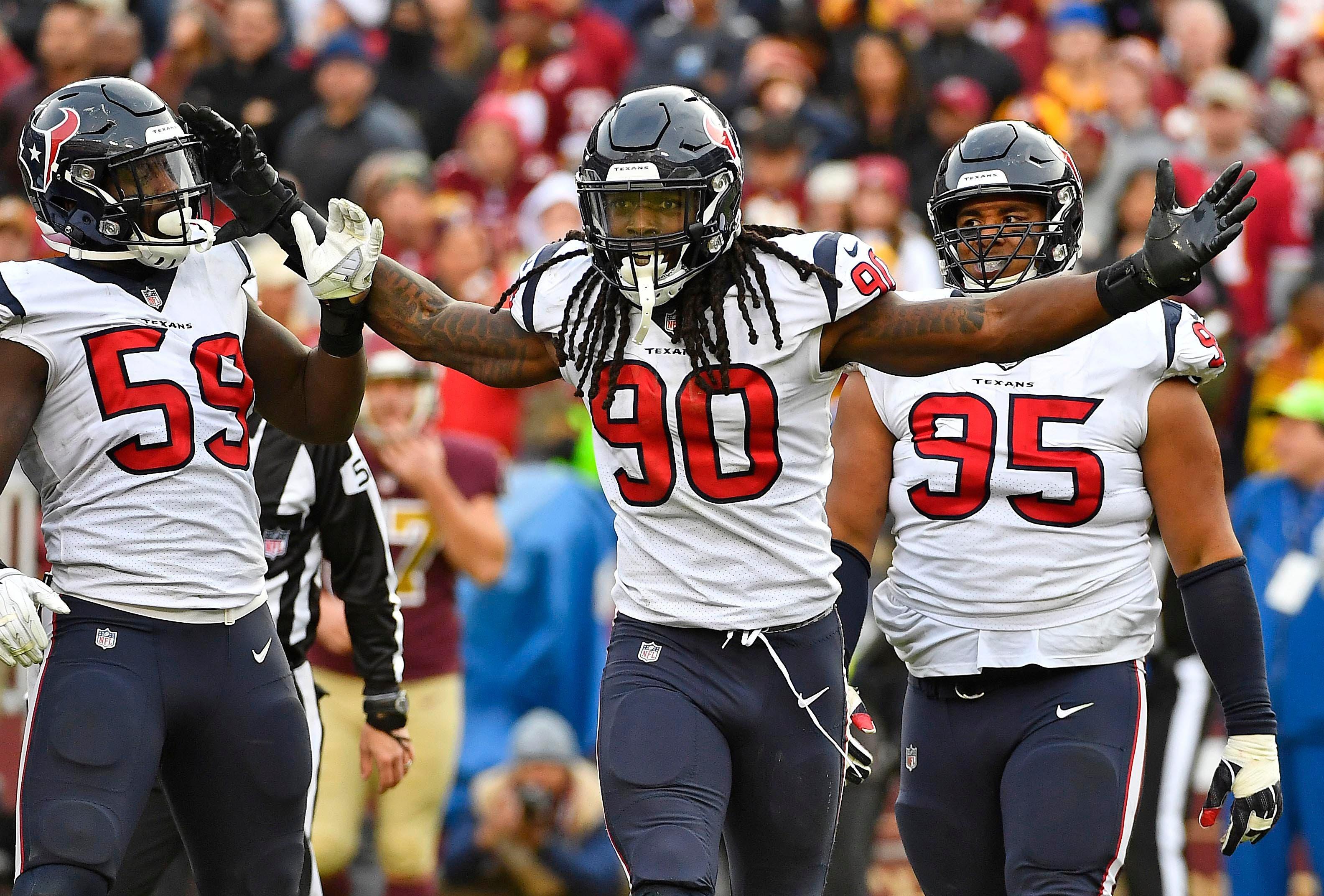 Nov 18, 2018; Landover, MD, USA; Houston Texans outside linebacker Jadeveon Clowney (90) celebrates after recording a sack against the Washington Redskins during the second half at FedEx Field. Mandatory Credit: Brad Mills-USA TODAY Sports / Brad Mills