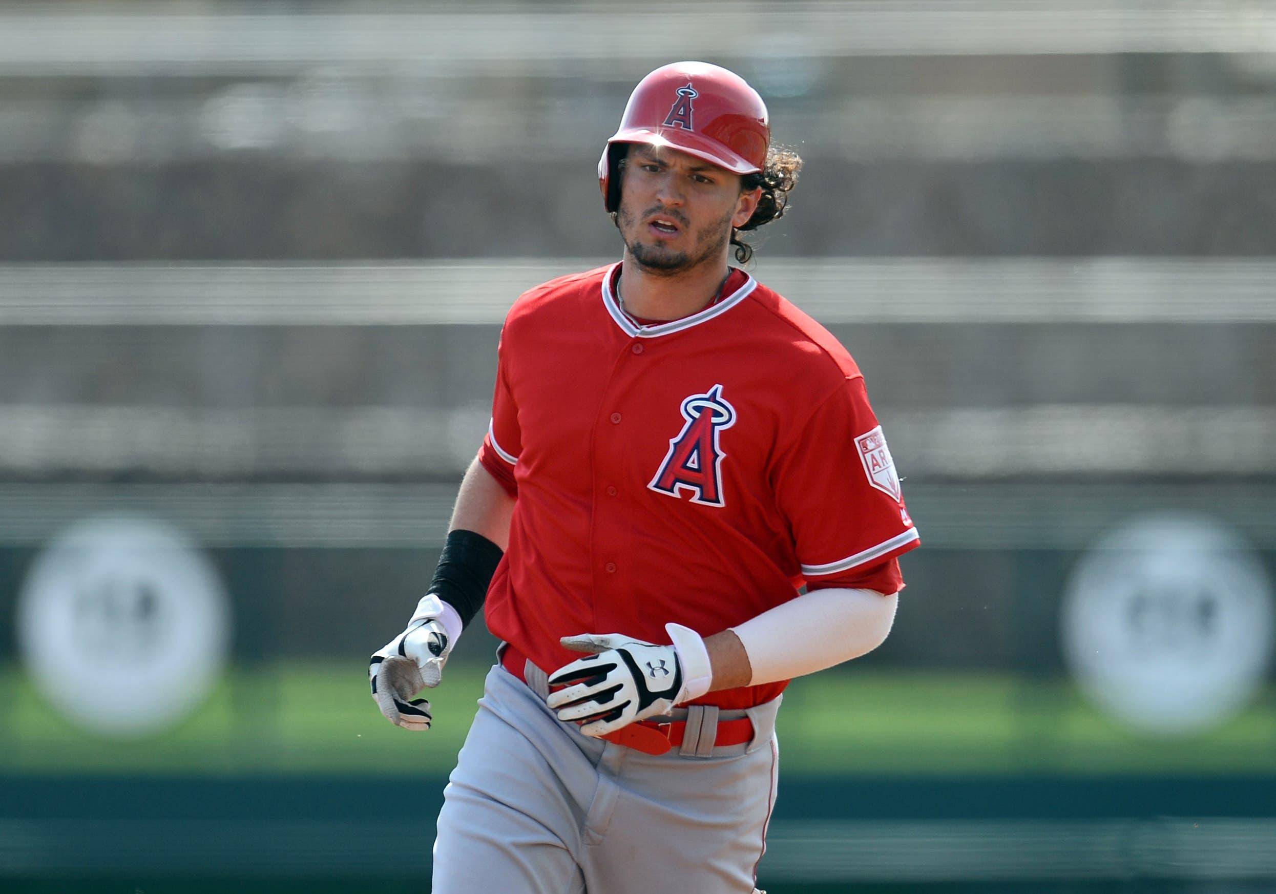 Mar 4, 2019; Phoenix, AZ, USA; Los Angeles Angels left fielder Jarrett Parker (16) runs the bases after hitting a two-run home run against the Chicago White Sox during the first inning at Camelback Ranch. Mandatory Credit: Joe Camporeale-USA TODAY Sports / Joe Camporeale