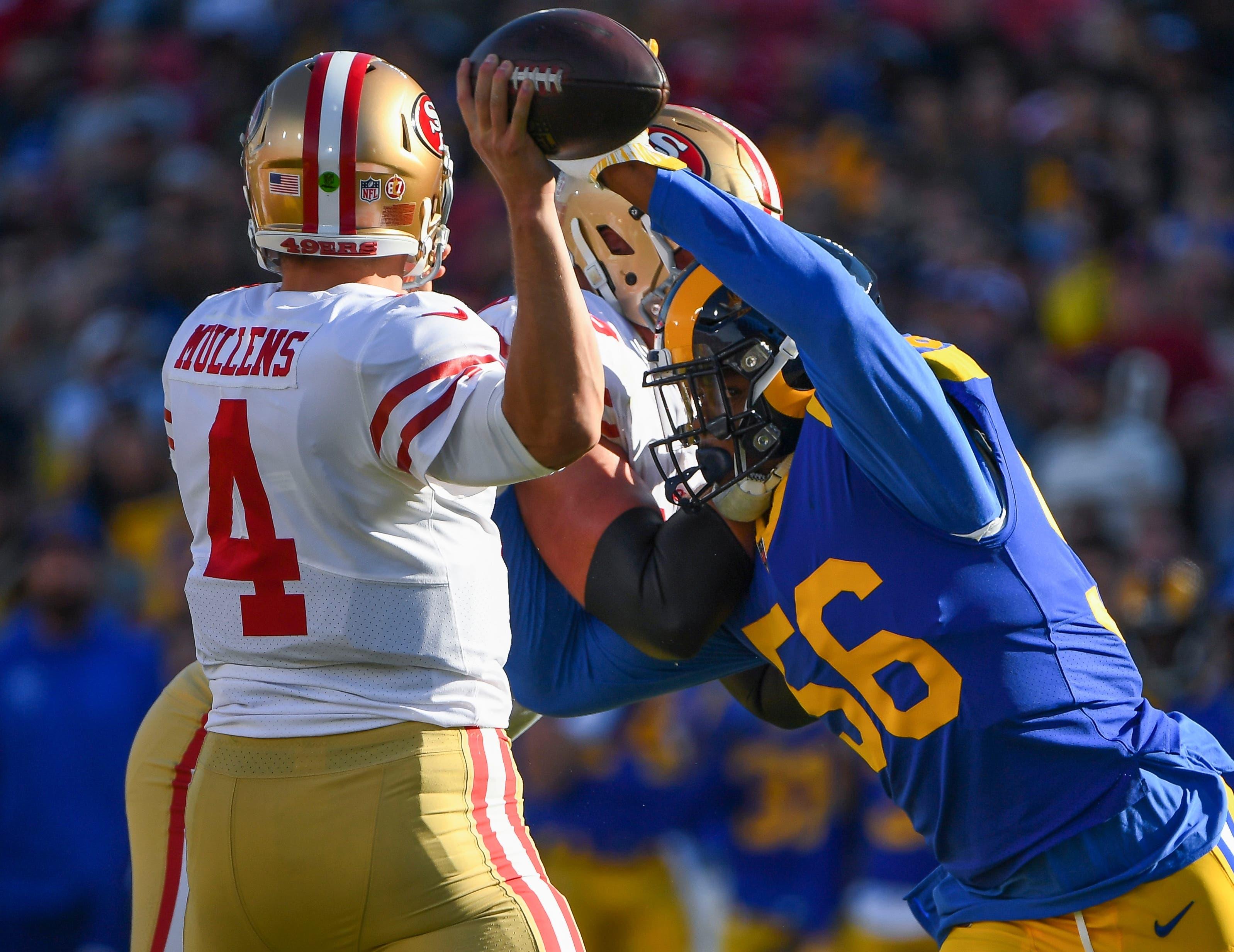 Dec 30, 2018; Los Angeles, CA, USA; Los Angeles Rams linebacker Dante Fowler (56) pressures San Francisco 49ers quarterback Nick Mullens (4) during the first half at Los Angeles Memorial Coliseum. Mandatory Credit: Robert Hanashiro-USA TODAY Sports / Robert Hanashiro