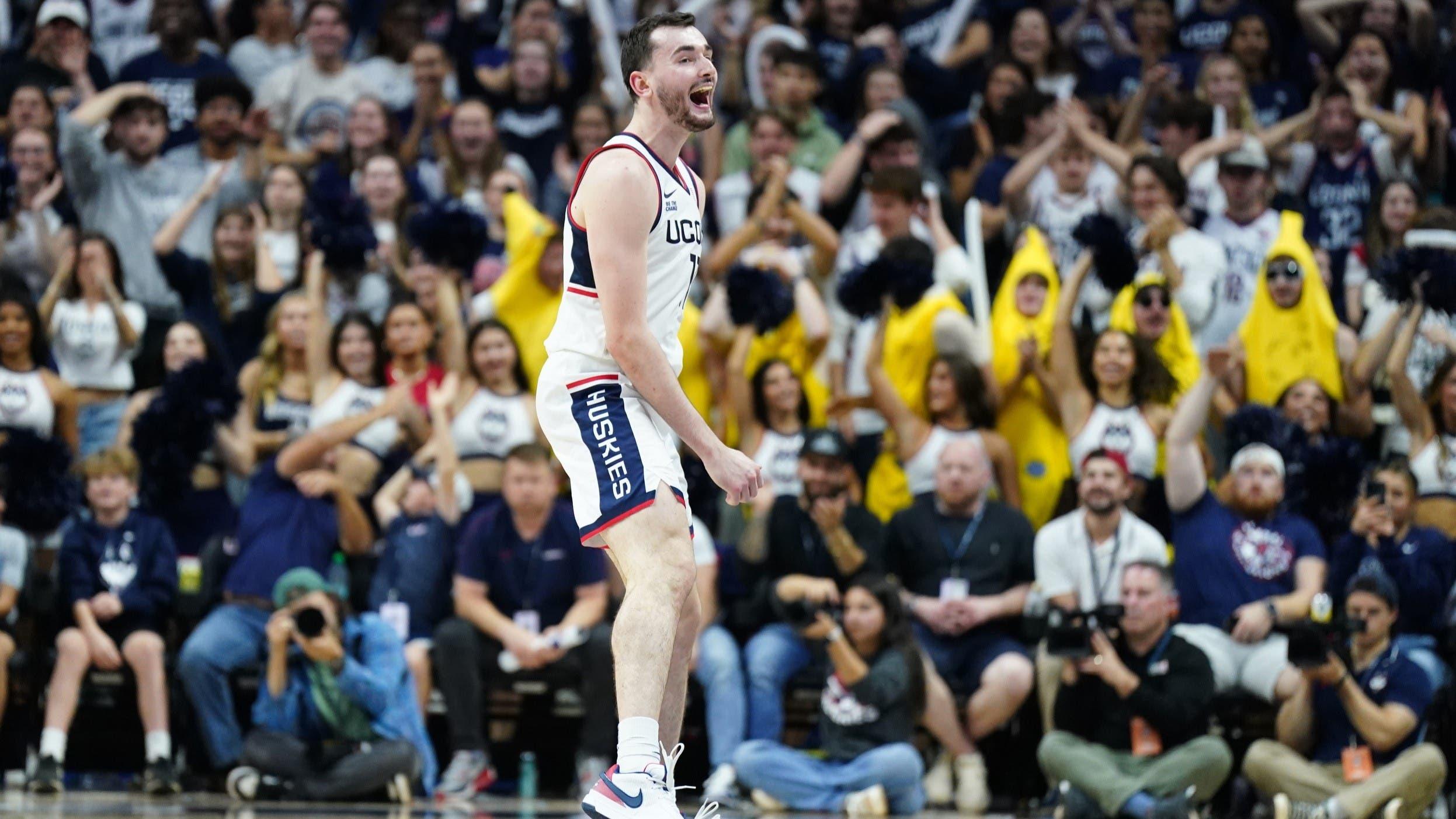 Nov 6, 2024; Storrs, Connecticut, USA; Connecticut Huskies forward Alex Karaban (11) reacts after a play against the Sacred Heart Pioneers in the second half at Harry A. Gampel Pavilion. / David Butler II-Imagn Images